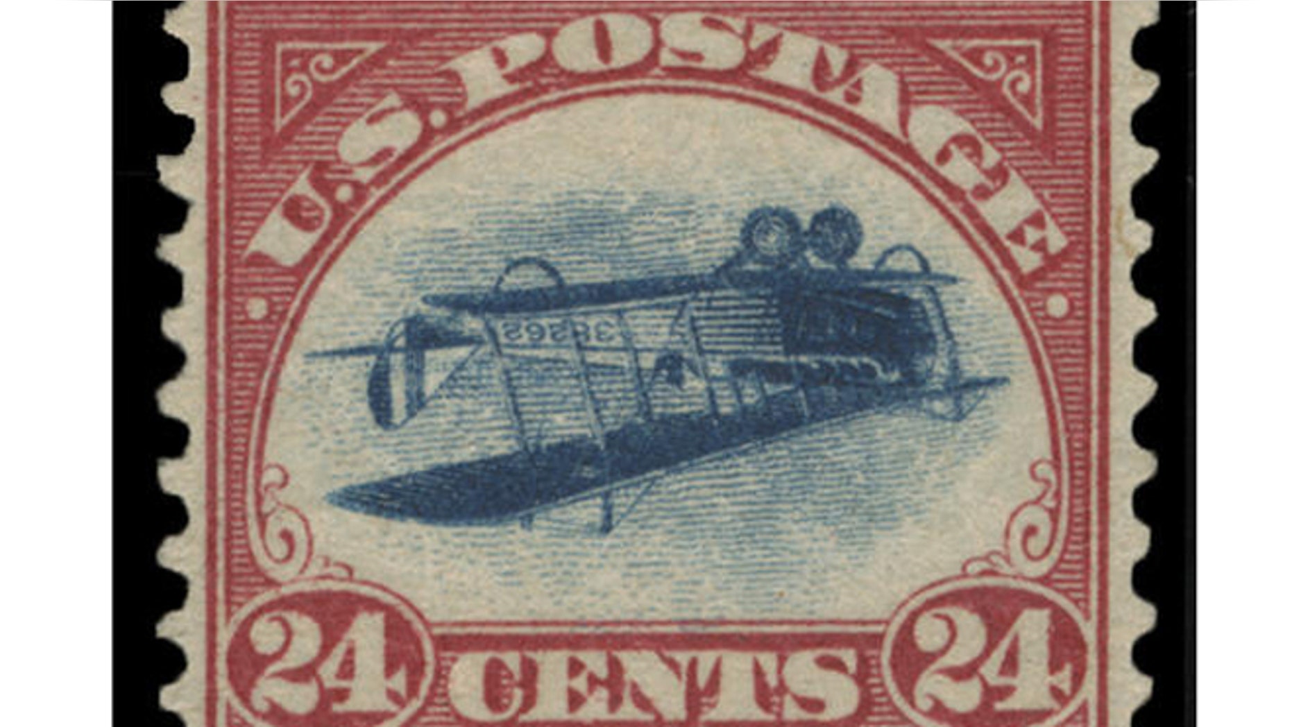 This undated photo provided by Spink, USA, shows a 1918 "inverted Jenny" stamp that was stolen in 1955. (Spink USA via AP)
