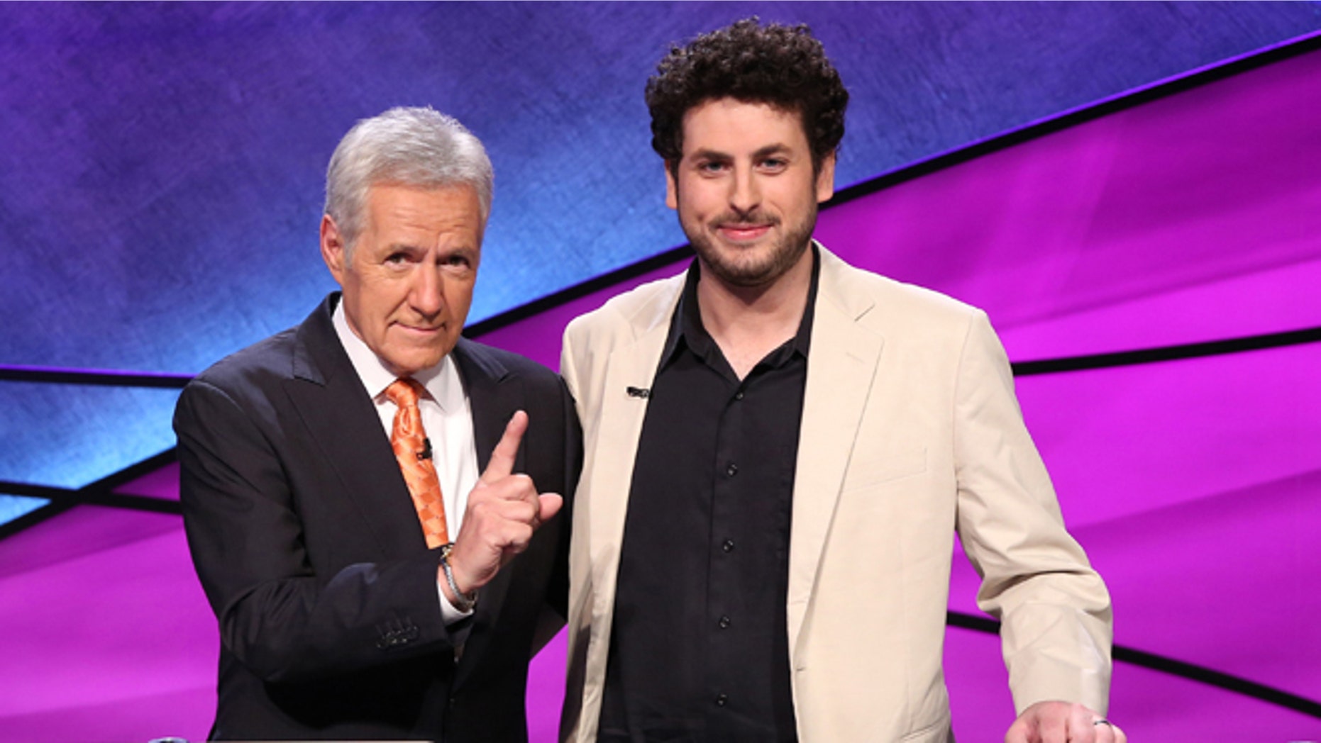 Nov. 2015. Alex Trebek, left, and winner Alex Jacob, 31, of the "Jeopardy! Tournament of Champions."