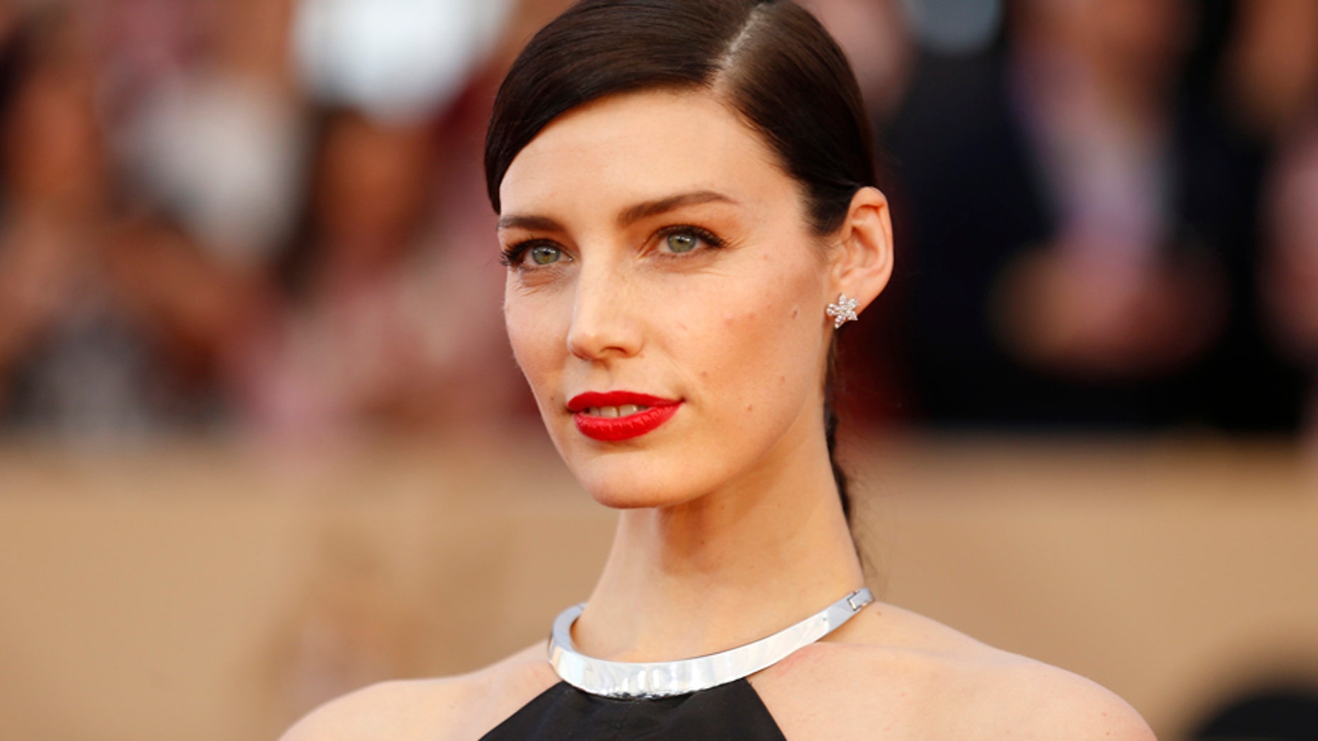 Actress Jessica Pare arrives at the 22nd Screen Actors Guild Awards in Los Angeles, California January 30, 2016.