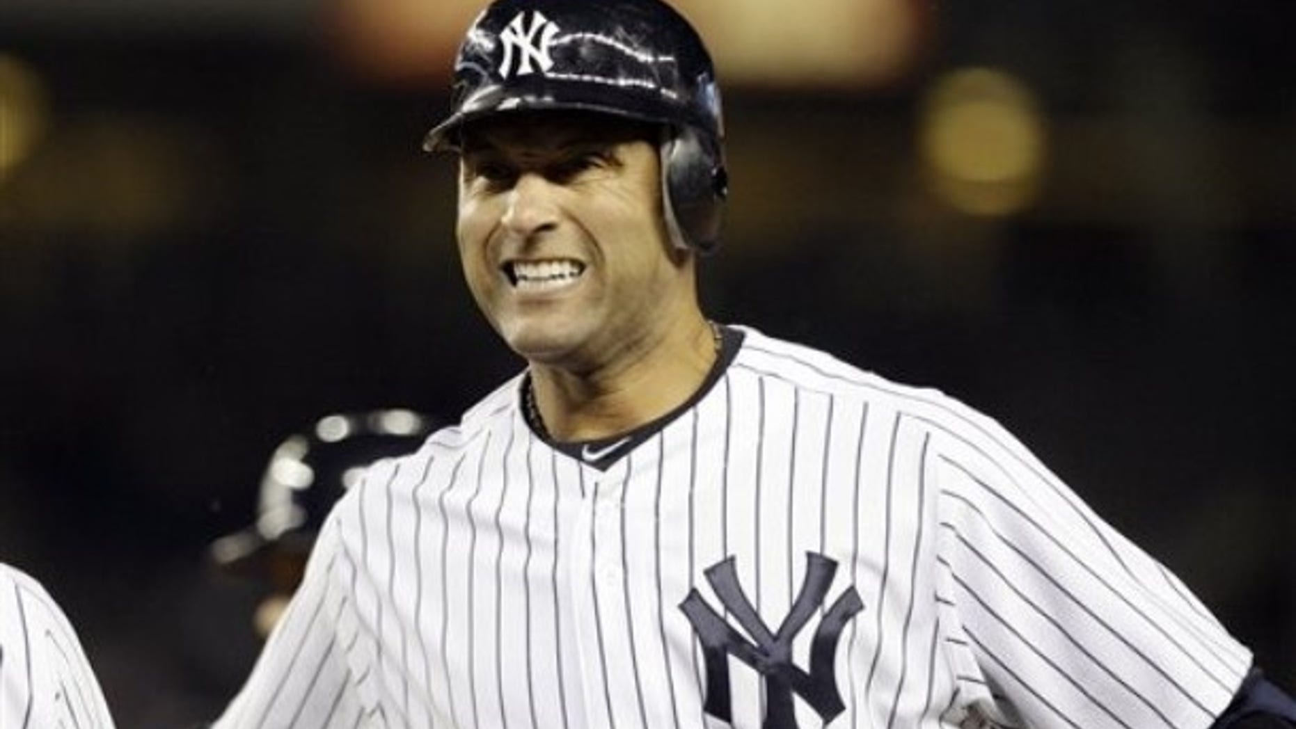 New York Yankees' Derek Jeter (2) reacts after hitting a fly-out during the fourth inning of a baseball game against the Minnesota Twins at Yankee Stadium in New York, Wednesday, April 18, 2012.