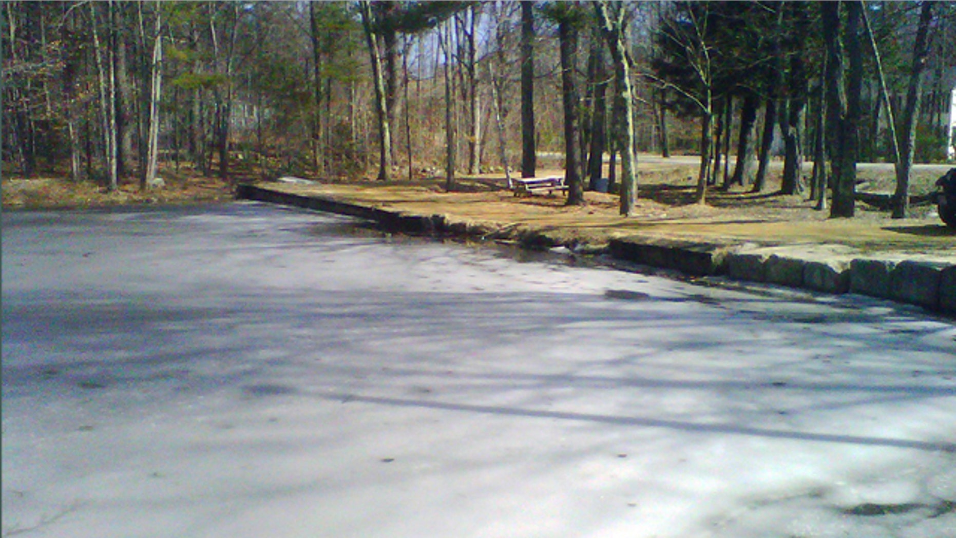 March 12, 2012: Ice partially covers the surface of Jew Pond in Mont Vernon, N.H. Residents can vote at a town meeting Tuesday whether to petition to officially change the name, which appears on a 1968 map but not on any town signs. Some say the name is inappropriate and disrespectful. Others says it was never meant to be offensive and is part of the towns history.