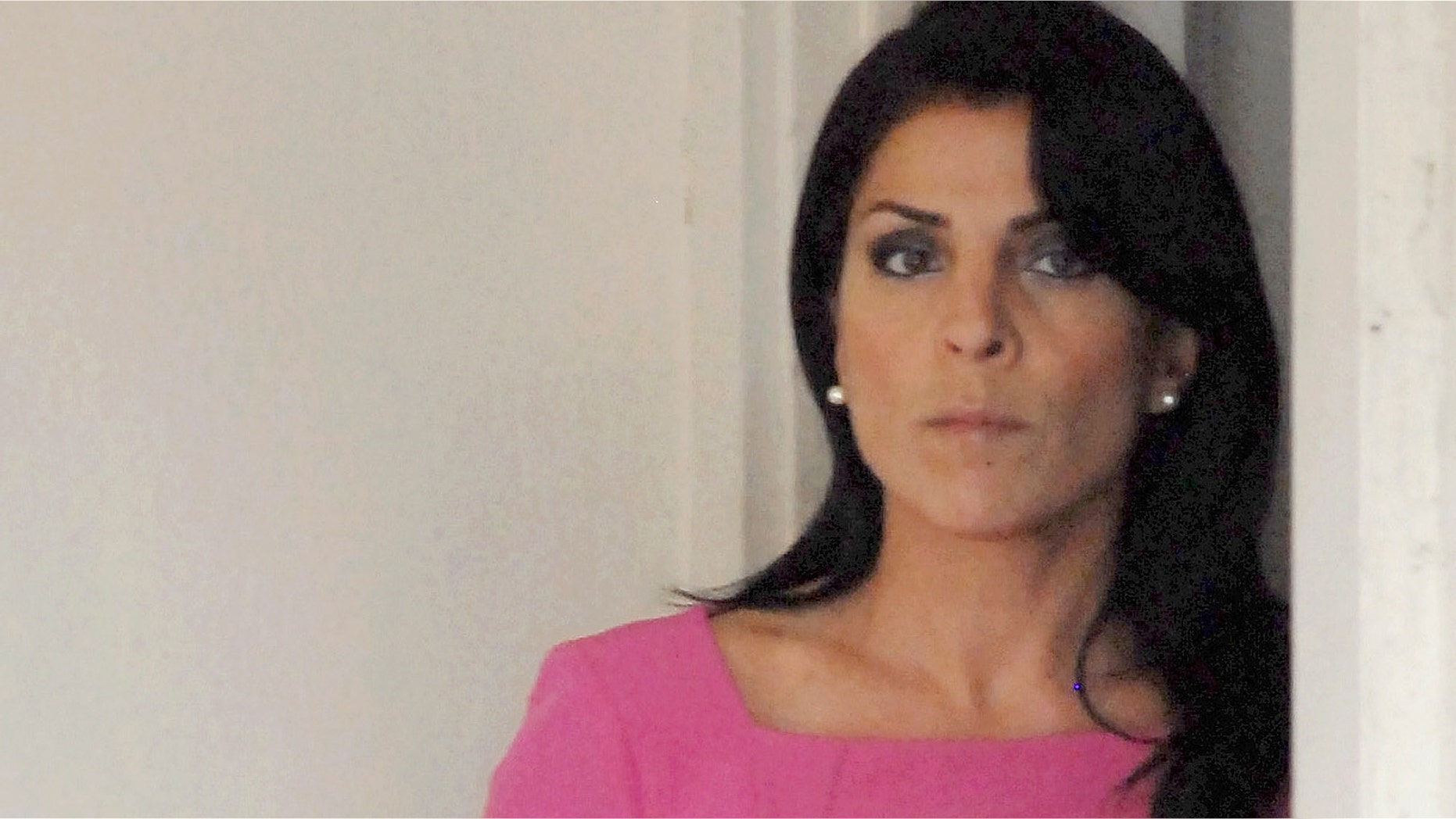 TAMPA, FL - NOVEMBER 13: Jill Kelley leaves her home on November 13, 2012 in Tampa, Florida. Kelley, who is reported to be involved with the military community at MacDill Air Force Base, reported receiving harassing emails to the FBI, which resulted in an investigation that revealed the sender to be Paula Broadwell, who was found to be having an affair with Gen. David H. Petraeus. (Photo by Tim Boyles/Getty Images)