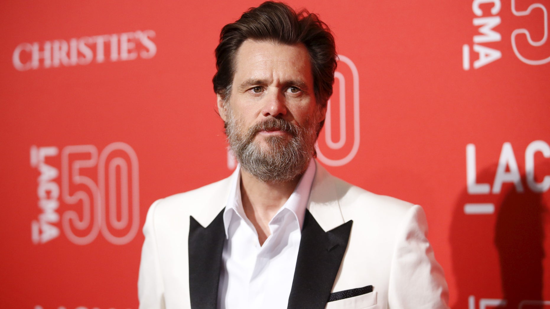 April 18, 2015. Actor Jim Carrey poses at LACMA's 50th anniversary gala in Los Angeles, California.