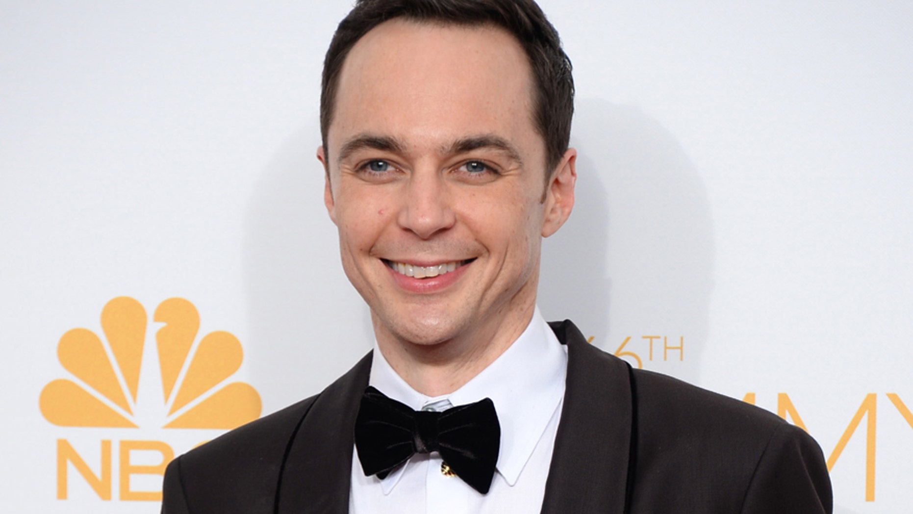 FILE - In this Aug. 25, 2014 file photo, Jim Parsons poses in the press room after winning the award for outstanding lead actor in a comedy series for his work on The Big Bang Theory at the 66th Annual Primetime Emmy Awards in Los Angeles.