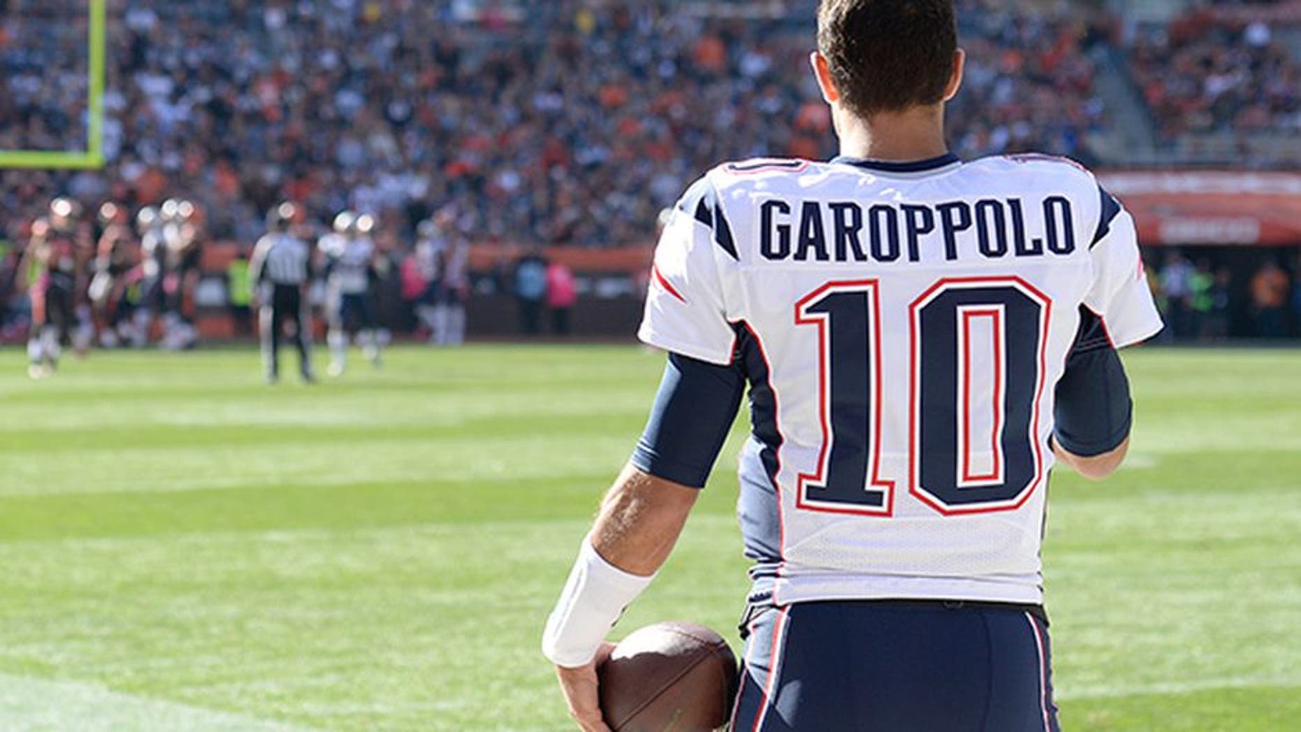 New England Patriots quaterback Jimmy Garoppolo (10) watches the action during the 2016 NFL week 5 regular season football game against the Cleveland Browns on Sunday, Oct. 9, 2016 in Cleveland. The Patriots defeated the Browns 33-13. (Jim Mahoney via AP)