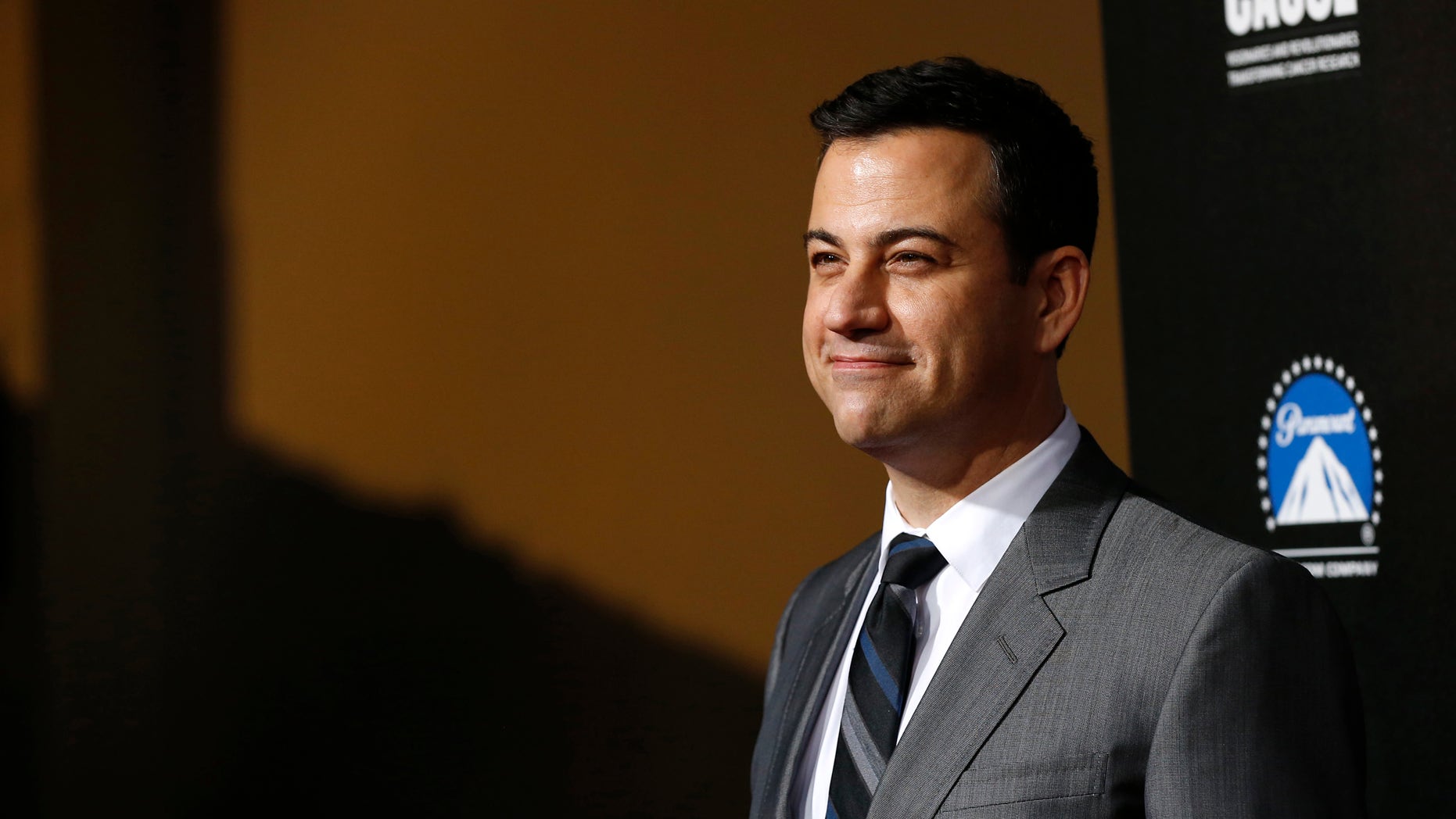 Television host Jimmy Kimmel poses at the second annual "Rebels With a Cause" gala at Paramount Pictures Studios in Los Angeles, California March 20, 2014. REUTERS/Mario Anzuoni