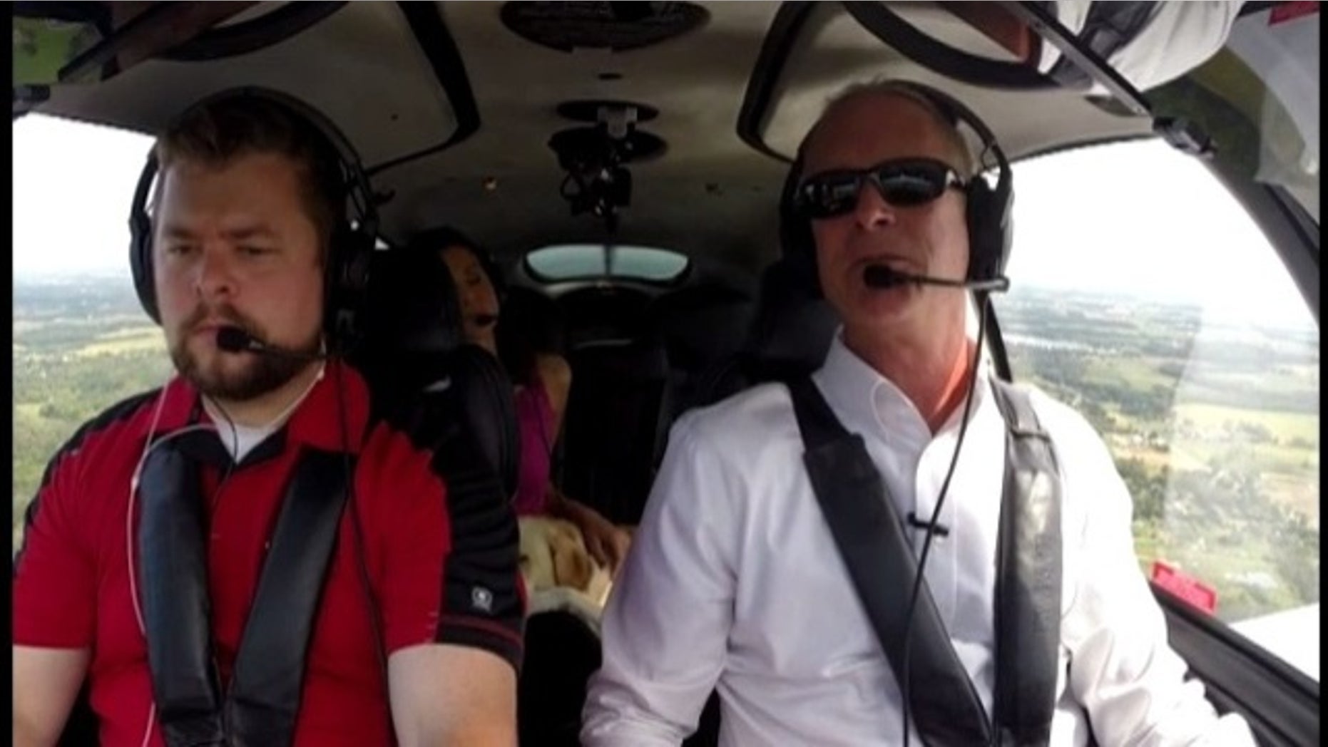 Jim Platzer, right, flies planes despite losing 95 percent of his vision.