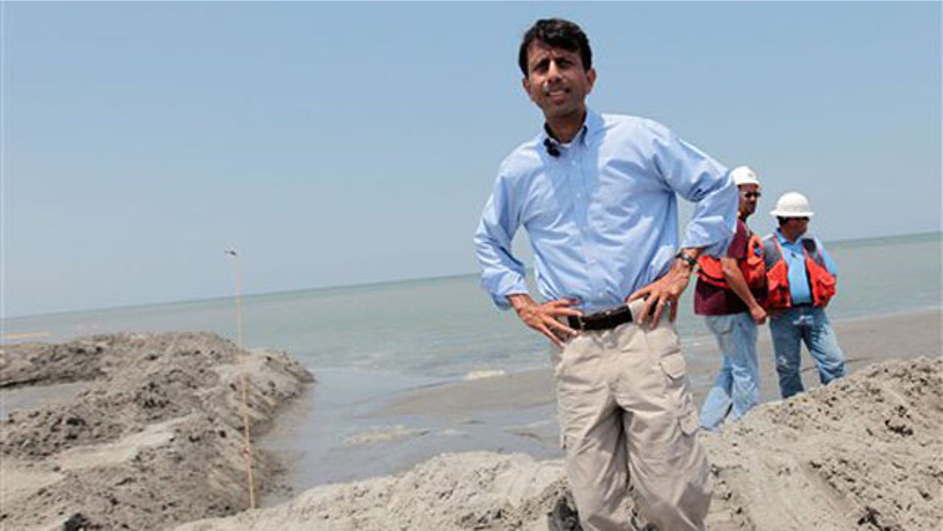 Louisiana Gov. Bobby Jindal looks over the berm system on the northern end of the Chandeleur Islands, La., July 15. (AP Photo)