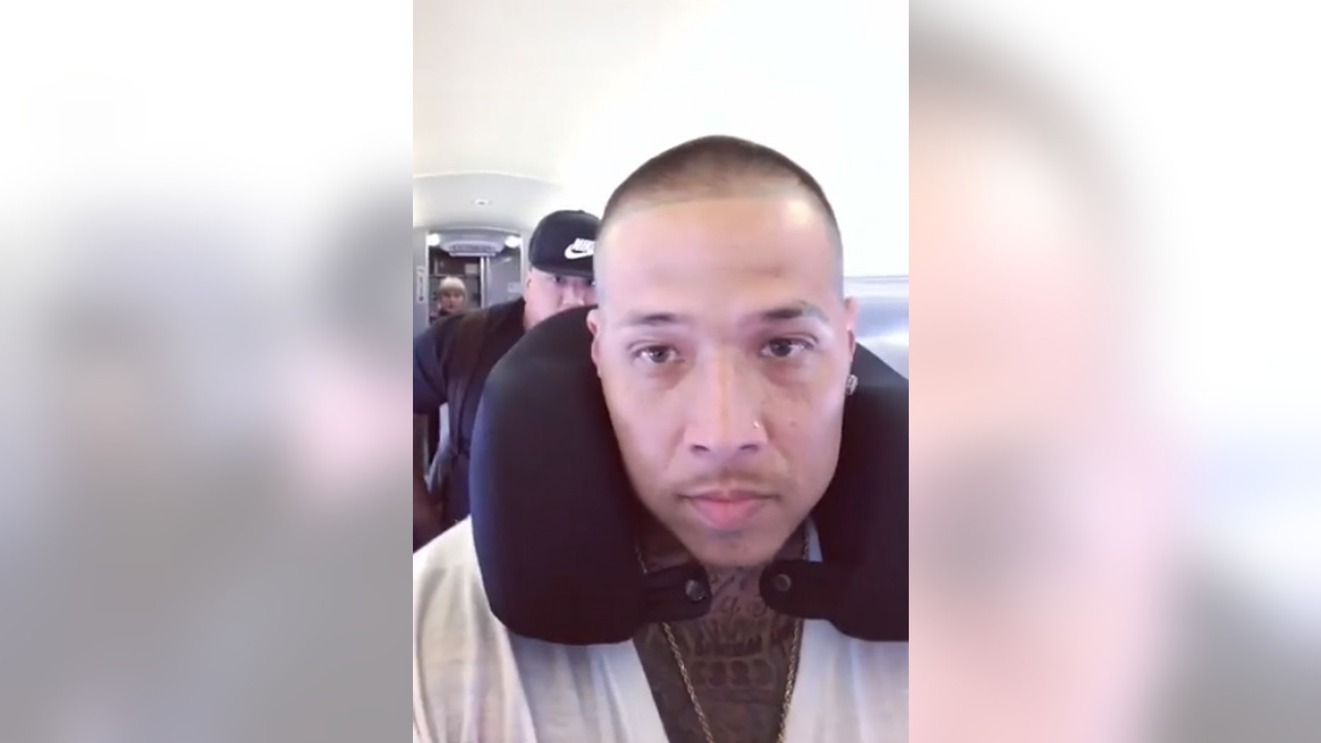 Jin Gates accused a JetBlue flight attendant of saying she didn't "feel safe" with him on the plane.
