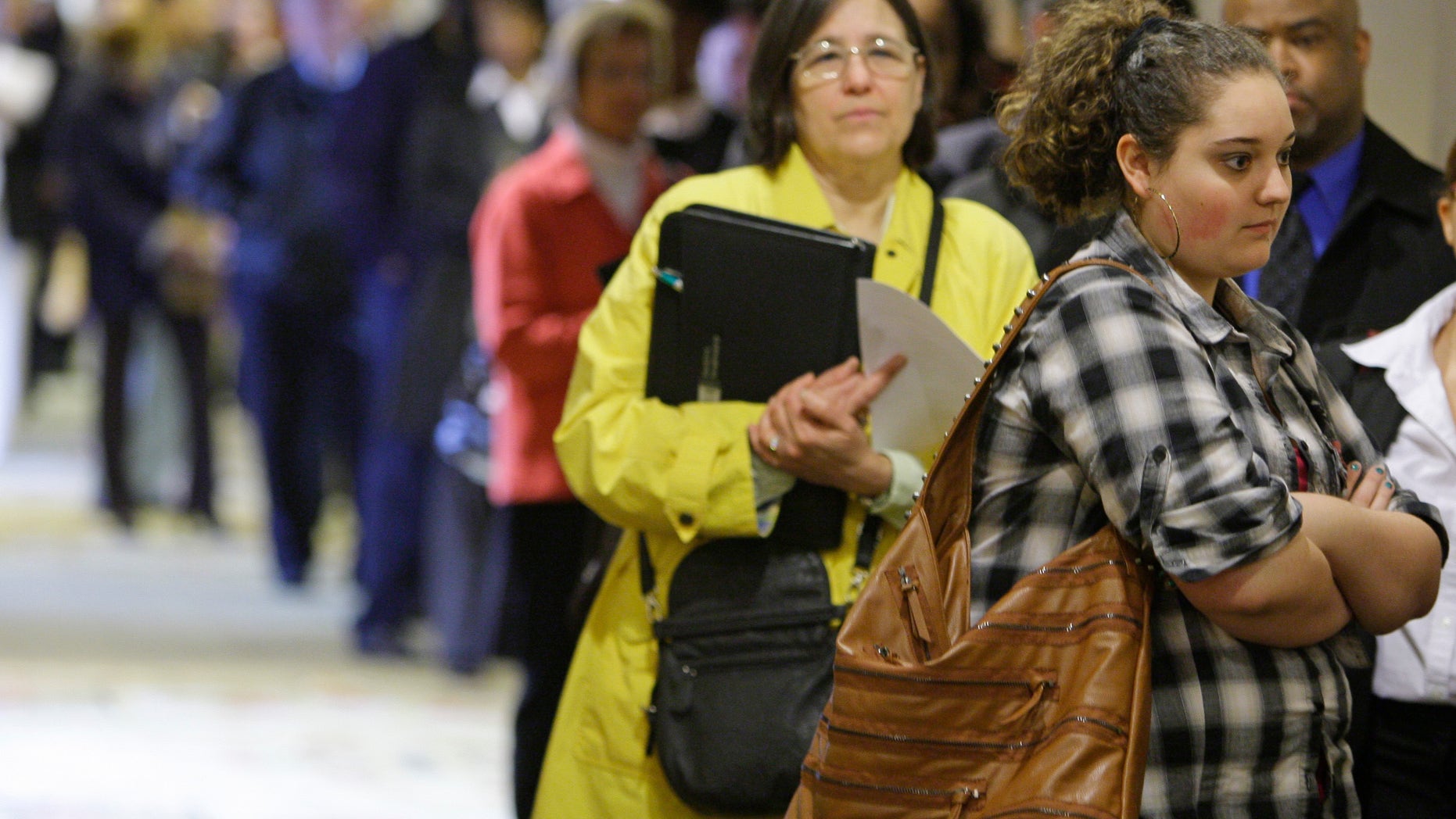May 3, 2011: Samantha Ferrara, 19, waits in line for a job fair to open, in Independence, Ohio.