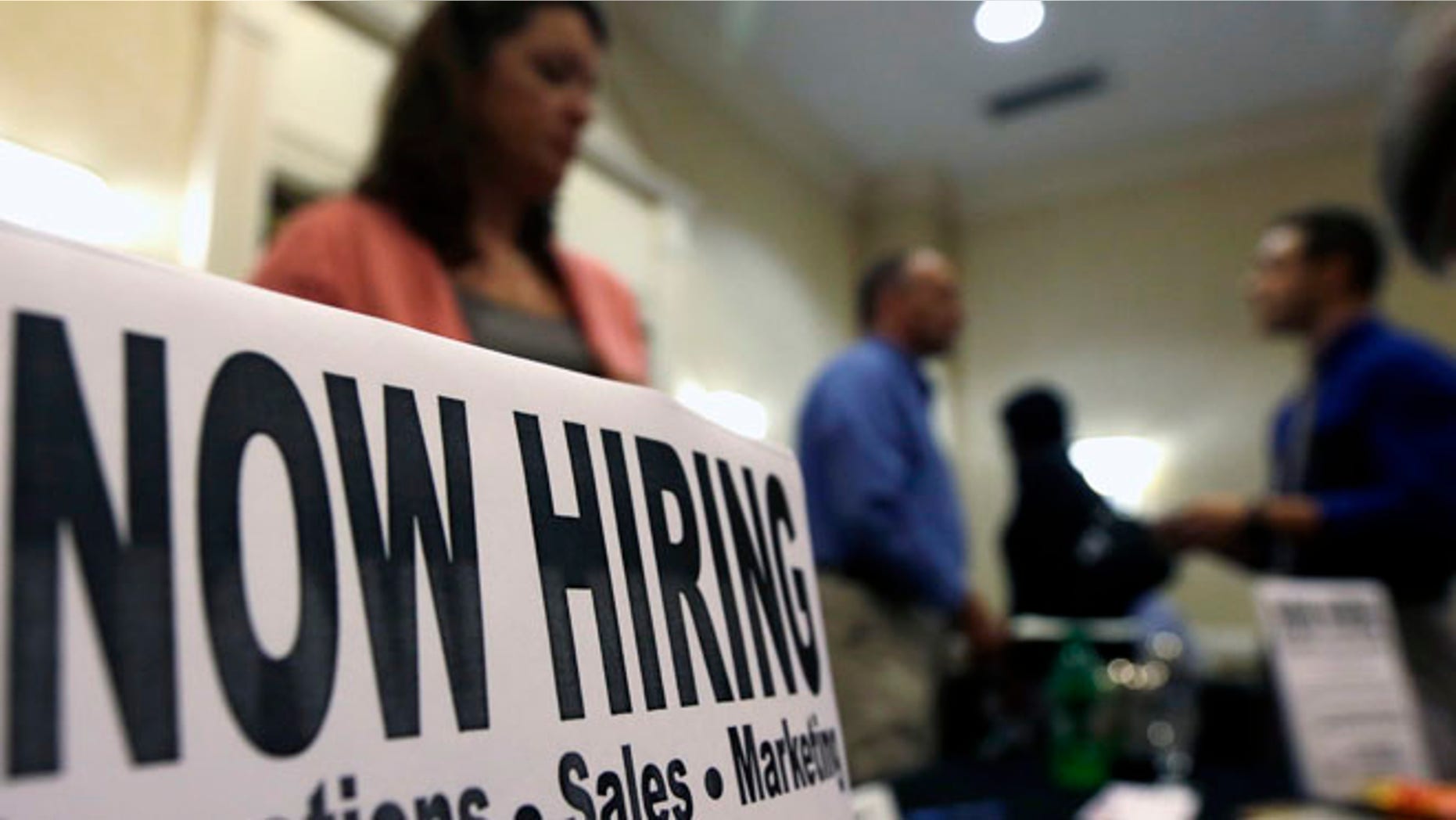 Oct. 25, 2012: A sign attracts job-seekers during a job fair at the Marriott Hotel in Colonie, N.Y.