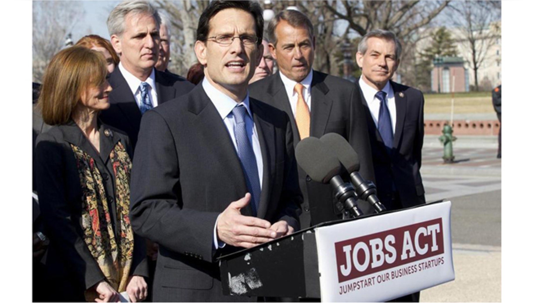 Feb. 28, 2012: House Majority Leader Eric Cantor (center) leads a news conference on Capitol Hillto announce the Jumpstart Our Business Startups Act.
