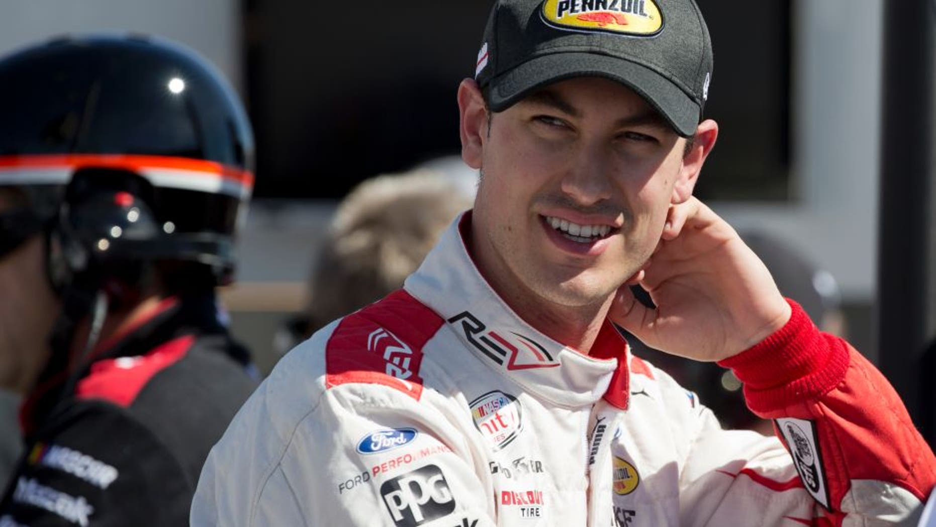 Joey Logano is shown in the pit area during qualifying for the Boyd Gaming 300, a NASCAR Xfinity Series auto race, at the Las Vegas Motor Speedway, Saturday, March 11, 2017, in Las Vegas. (AP Photo/Steve Marcus)