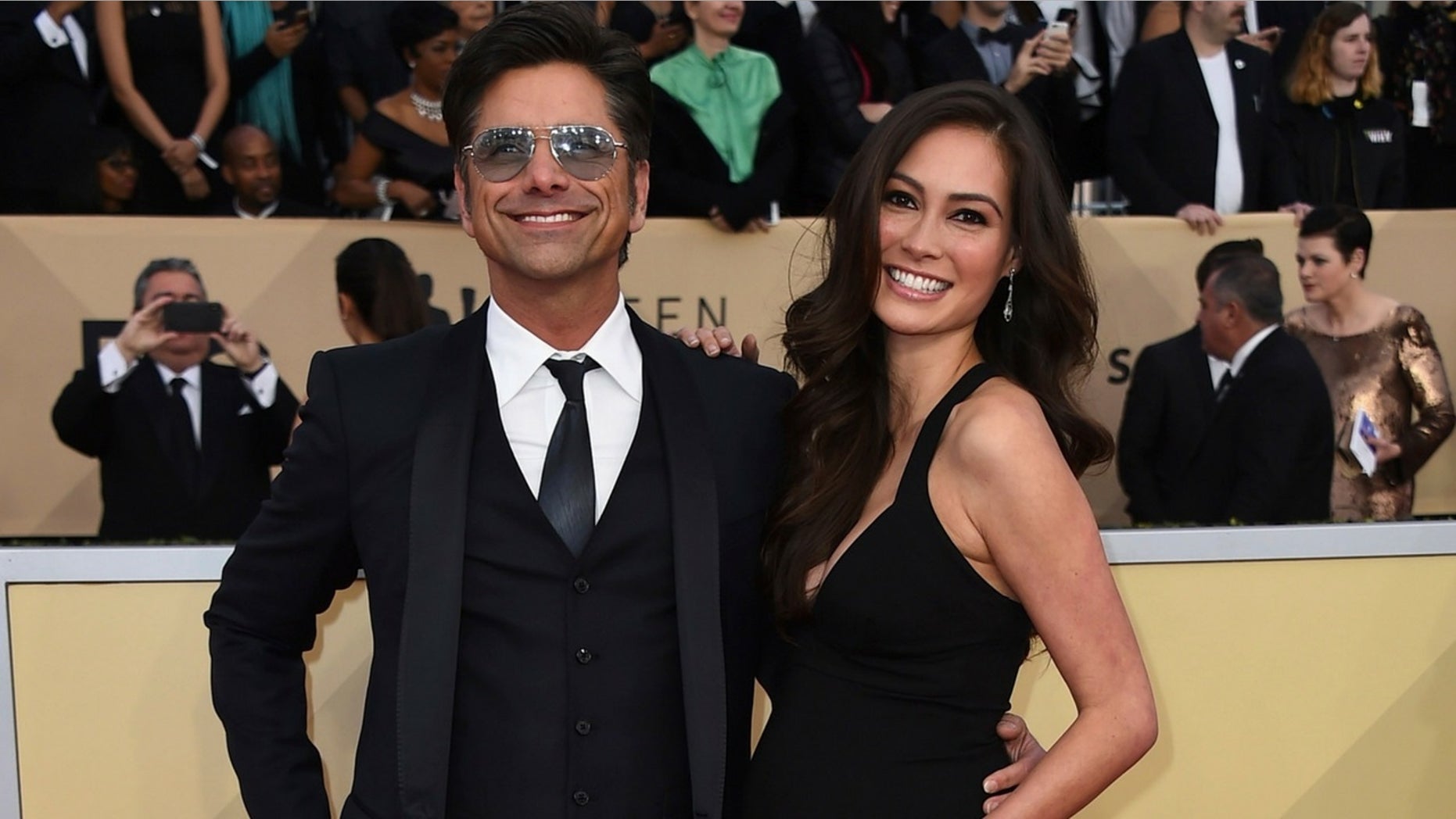 John Stamos's fiancee, Caitlin McHugh, was reportedly robbed just days before their wedding.