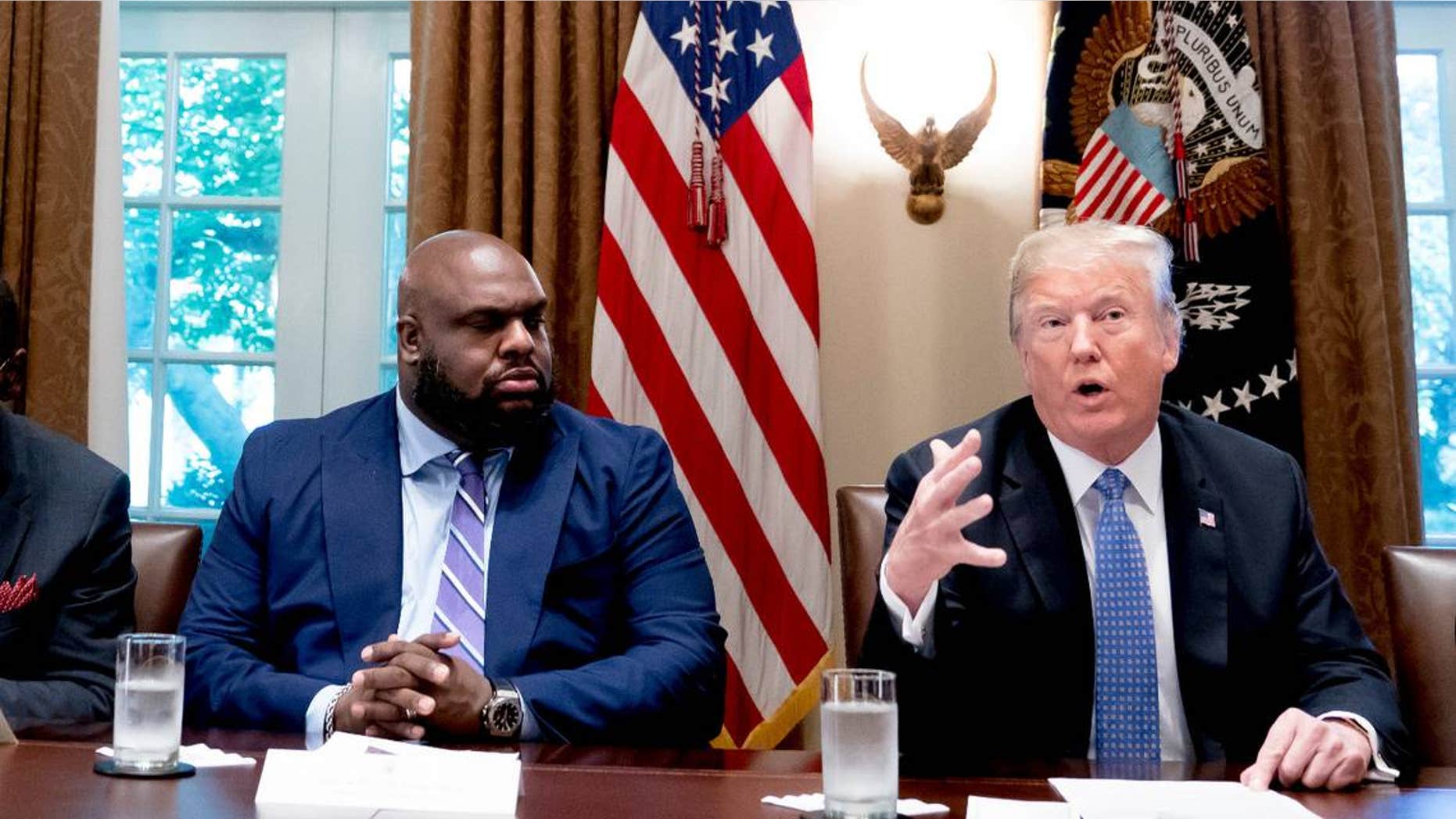 The Rev. John Gray, pastor of Relentless Church in Greenville, S.C., and other religious leaders meet with President Trump at the White House, Aug. 1, 2018.