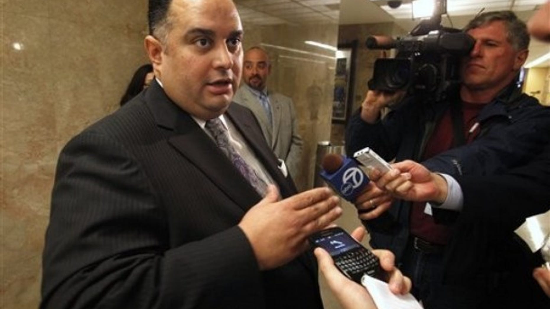 Assembly Speaker John Perez, D-Los Angeles, talks with reporters as he leaves a meeting with Gov. Jerry Brown and Senate President Pro Tem Darrell Steinberg, D-Sacramento, to discuss the state budget at Capitol in Sacramento, Calif. , Monday March 21, 2011. (AP)