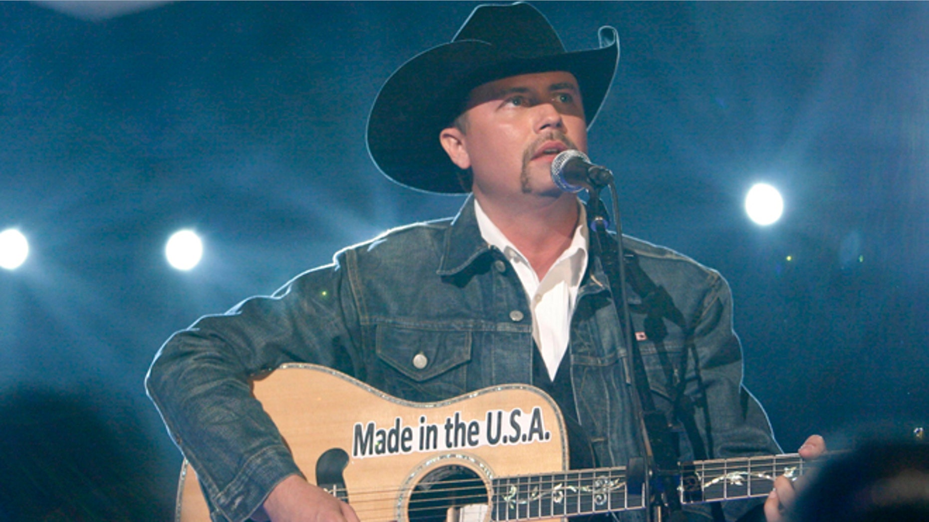 John Rich sings "Shuttin' Detroit Down" at the 44th Annual Academy of Country Music Awards in Las Vegas April 5, 2009. REUTERS/Mario Anzuoni (UNITED STATES ENTERTAINMENT) - RTXDONL