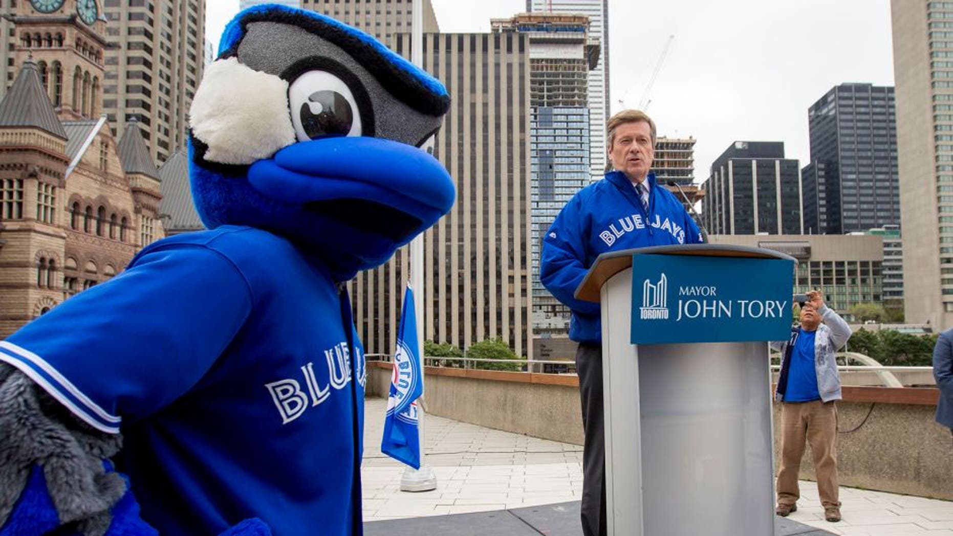 TORONTO, ON - OCTOBER 6 - Toronto Mayor John Tory held a special flag raising for the Toronto Blue Jays to kick of the 2015 post season. October 6, 2015. (Carlos Osorio/Toronto Star via Getty Images)