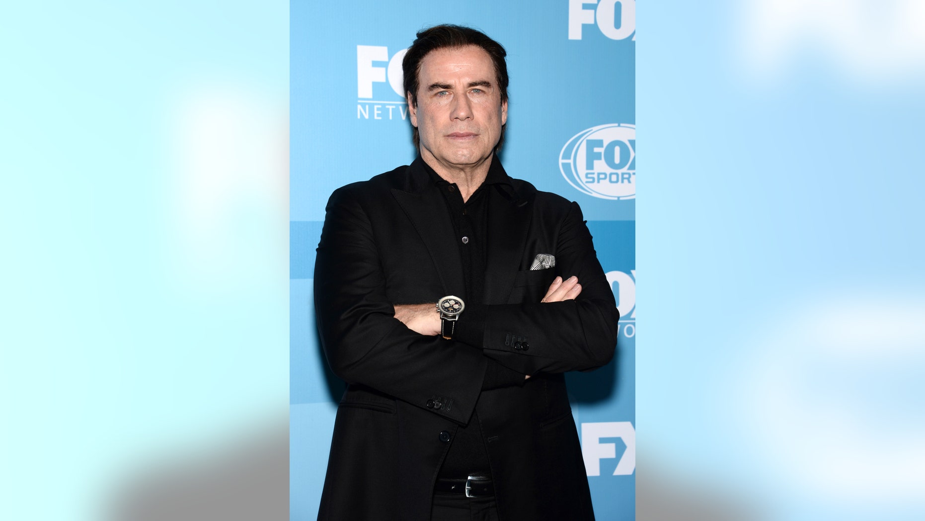 May 11, 2015. John Travolta arrives at the Fox Network 2015 Programming Upfront at Wollman Rink in Central Park in New York.