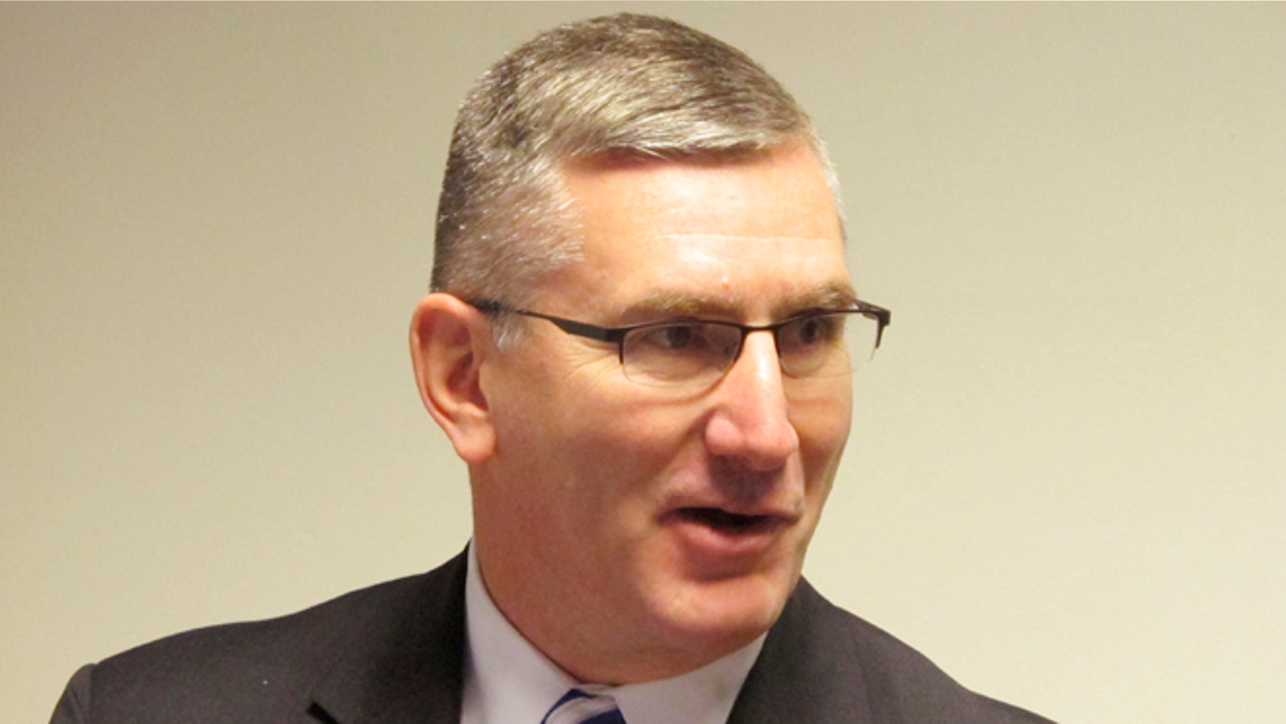 In this Jan. 26, 2014 file photo U.S. Sen. John Walsh speaks to reporters in Helena, Mont.