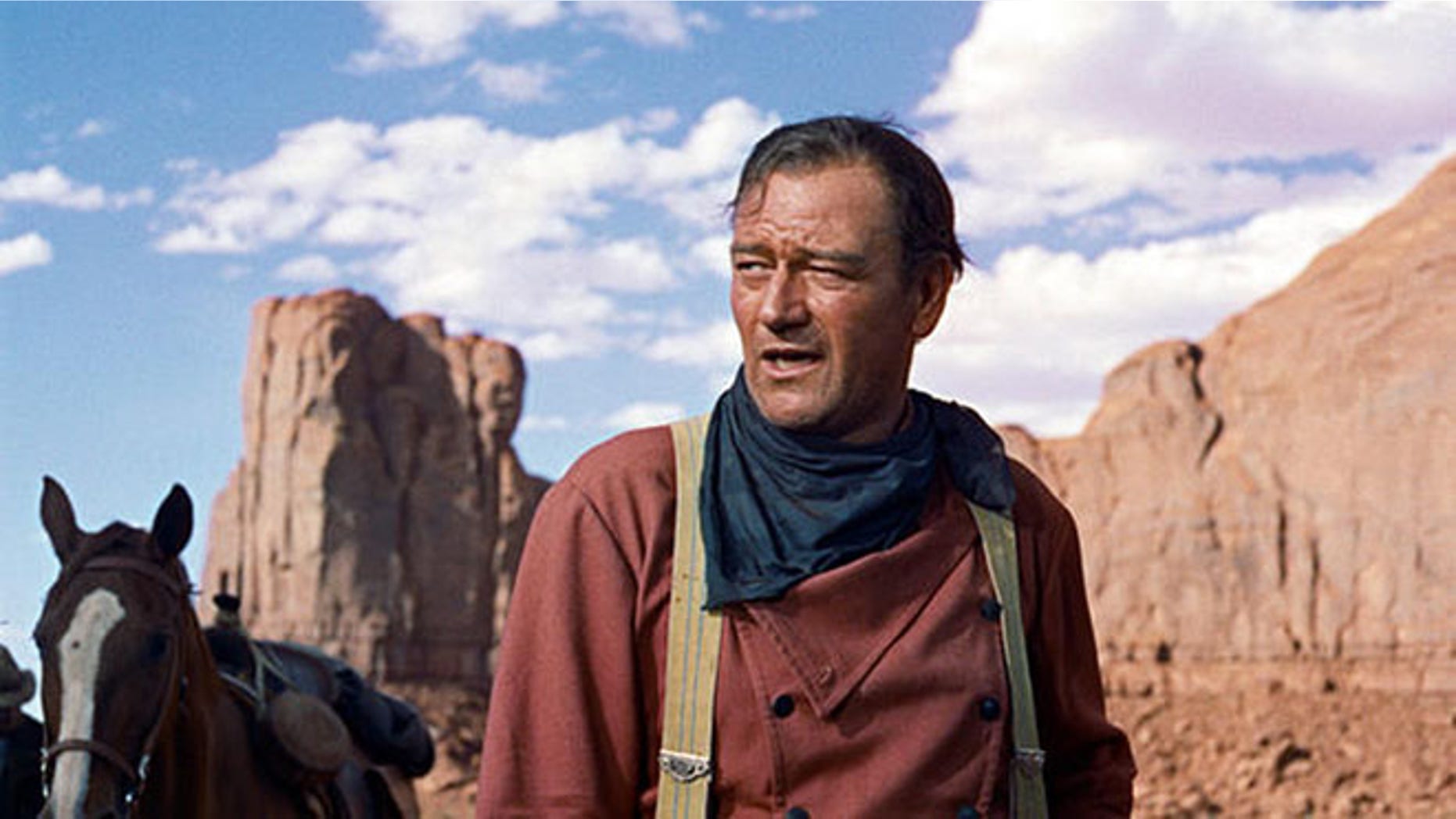In this photo released by Warner Bros., actor John Wayne plays Ethan Edwards in the 1956 film "The Searchers." The film is among the American Film Institute's best western movies.