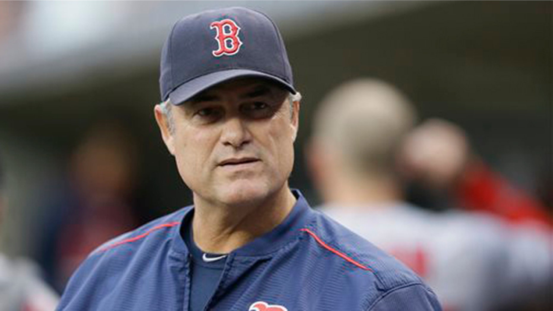 Aug. 8, 2015: In this photo, Boston Red Sox manager John Farrell watches from the dugout during the first inning of a baseball game against the Detroit Tigers in Detroit.