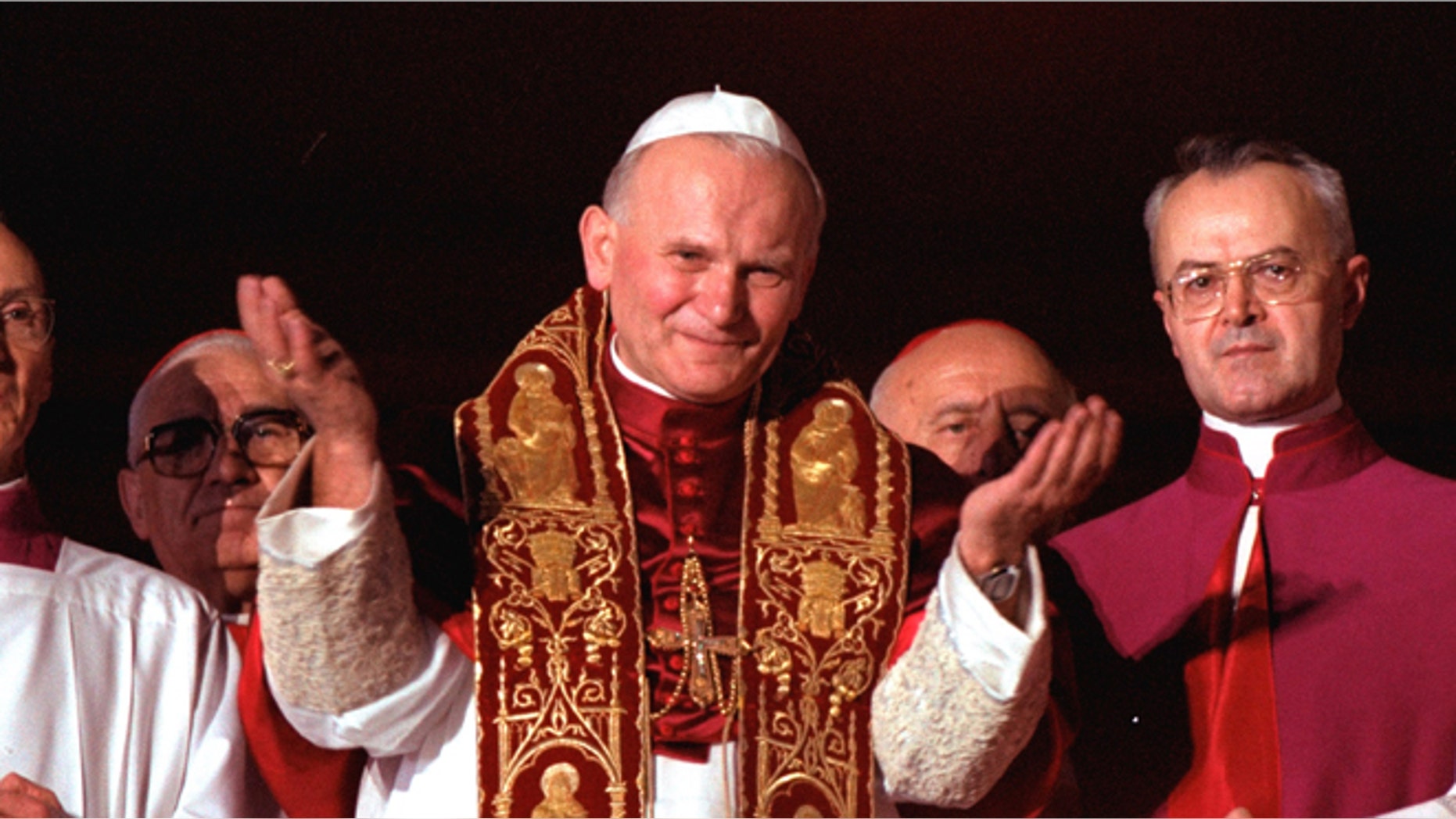 Oct. 22, 1978: Pope John Paul II blesses the faithful in St. Peter's Square from a Vatican City balcony right after he was named Pontiff. A Vatican official says Pope John Paul II has cleared the final obstacle before being made a saint. A commission of cardinals and bishops reportedly met Tuesday, July 2, 2013 to consider the case and signed off on it, leaving only Pope Francis to approve it. A Vatican official confirmed that the decision had been taken some time back and that Tuesday's meeting was essentially a formality. (AP)