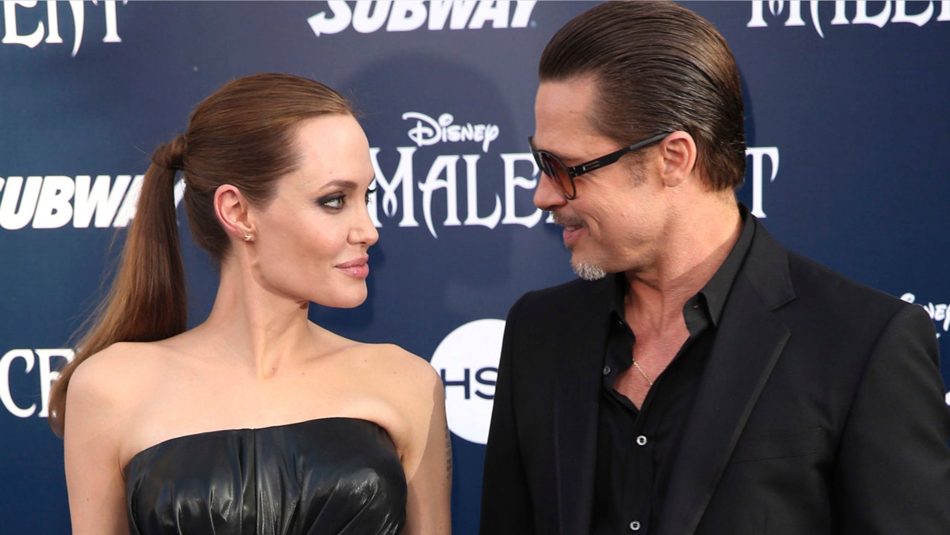 May 28, 2014: Angelina Jolie and Brad Pitt arrive at the world premiere of "Maleficent" in Los Angeles.