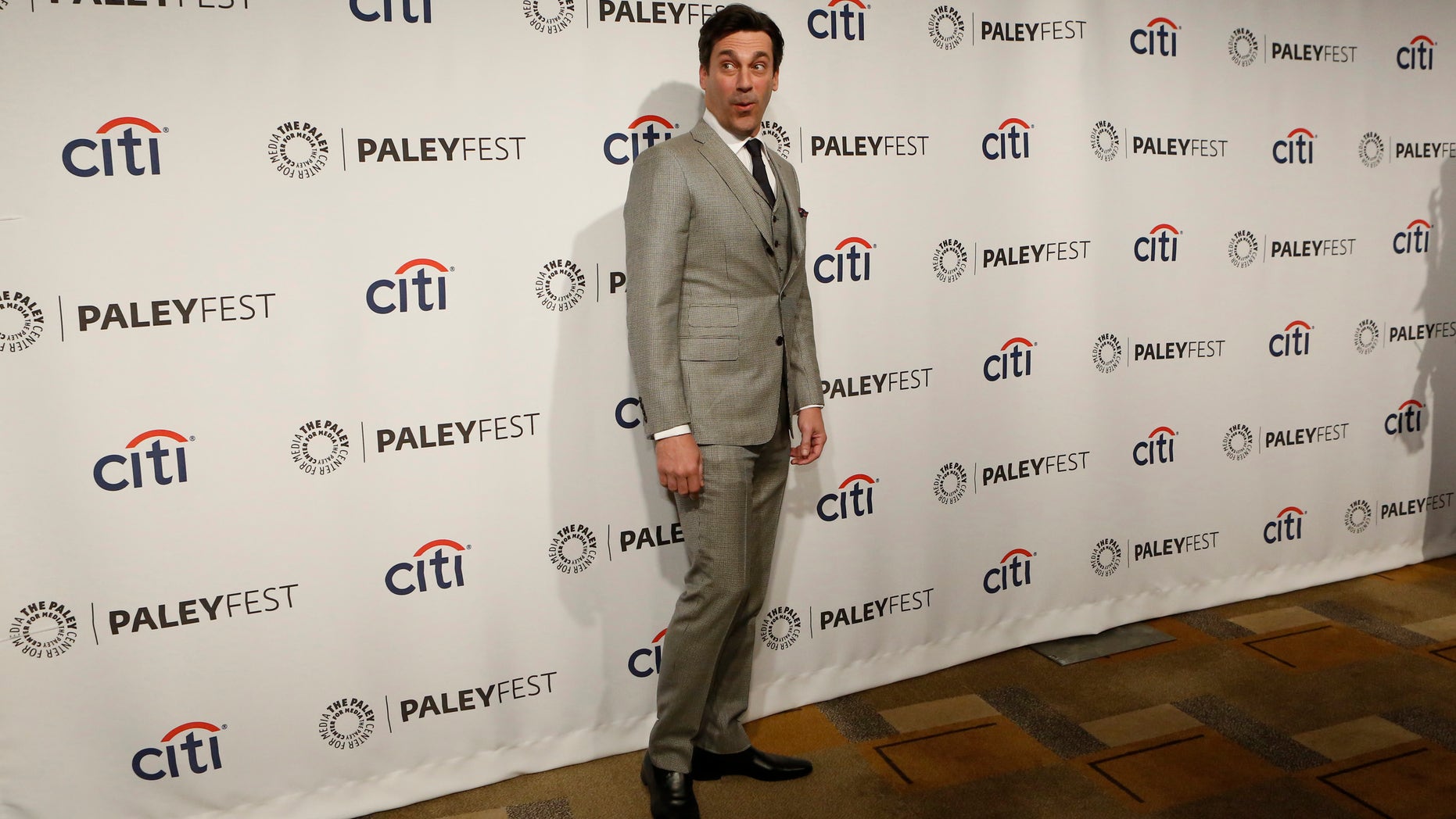 March 21, 2014. Cast member Jon Hamm poses as he arrives for a panel discussion for the television series "Mad Men" during the The William S. Paley Television Festival at the Dolby theatre in Hollywood, California.