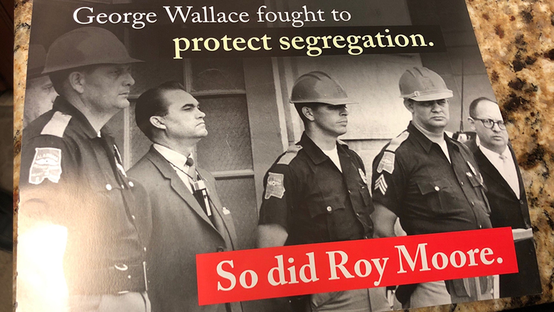 A mailer for Alabama Senate Democratic nominee Doug Jones compared Republican opponent Roy Moore to the former segregationist governor George Wallace.