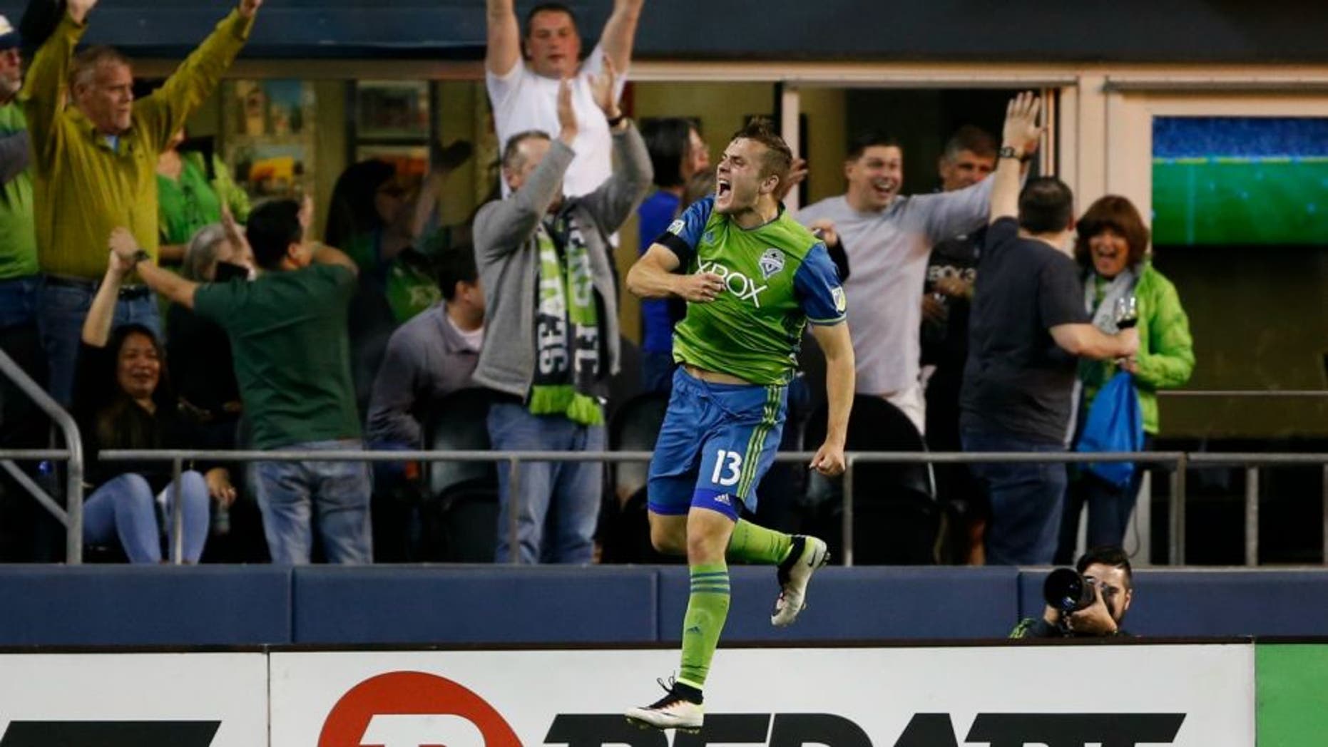 Apr 16, 2016; Seattle, WA, USA; Seattle Sounders forward Jordan Morris (13) leaps up after scoring against the Philadelphia Union during the second half at CenturyLink Field. Seattle won 2-1. Mandatory Credit: Jennifer Buchanan-USA TODAY Sports