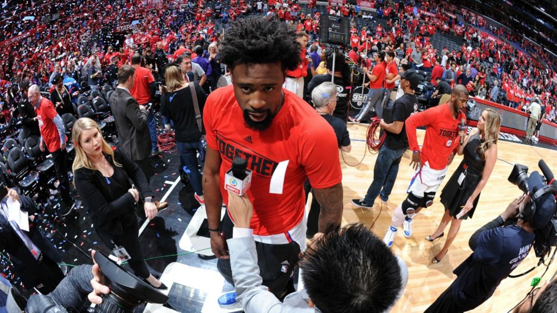 LOS ANGELES, CA - APRIL 17: DeAndre Jordan #6 of the Los Angeles Clippers is interviewed after the game against the Portland Trail Blazers in Game One of the Western Conference Quarterfinals during the 2016 NBA Playoffs on April 17, 2016 at STAPLES Center in Los Angeles, California. NOTE TO USER: User expressly acknowledges and agrees that, by downloading and/or using this Photograph, user is consenting to the terms and conditions of the Getty Images License Agreement. Mandatory Copyright Notice: Copyright 2016 NBAE (Photo by Andrew D. Bernstein/NBAE via Getty Images)