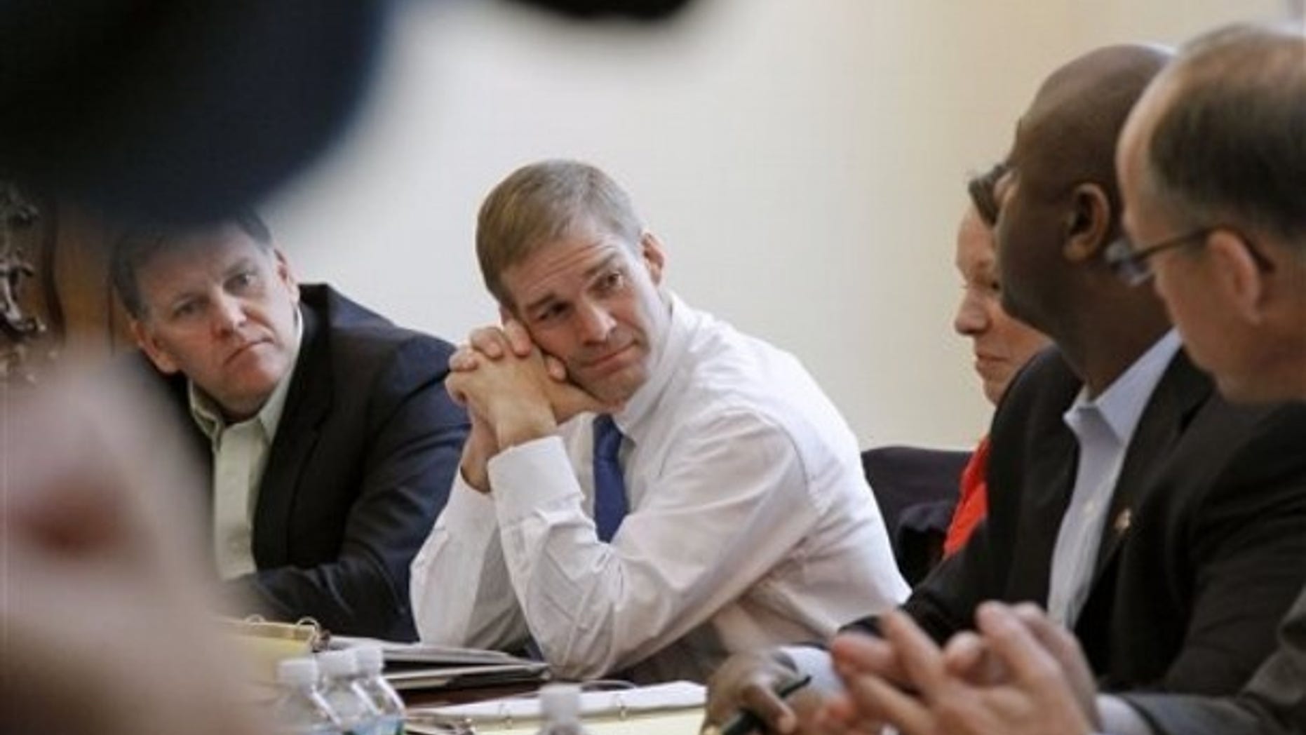 FILE: Nov. 9, 2010: Rep. Jim Jordan, center, meets with other House Republicans on Capitol Hill, in Washington, D.C.