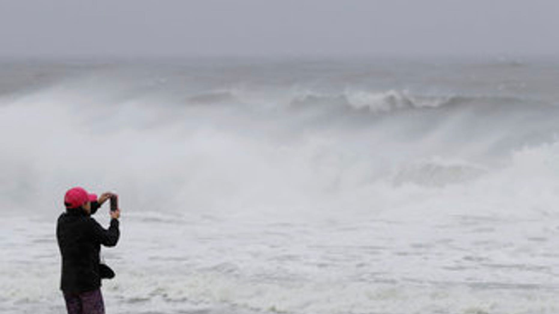 Swells caused by Hurricane Jose are recorded by Linda DiGuiseppe on her smartphone on Sept. 19, 2017, in Belmar, N.J.