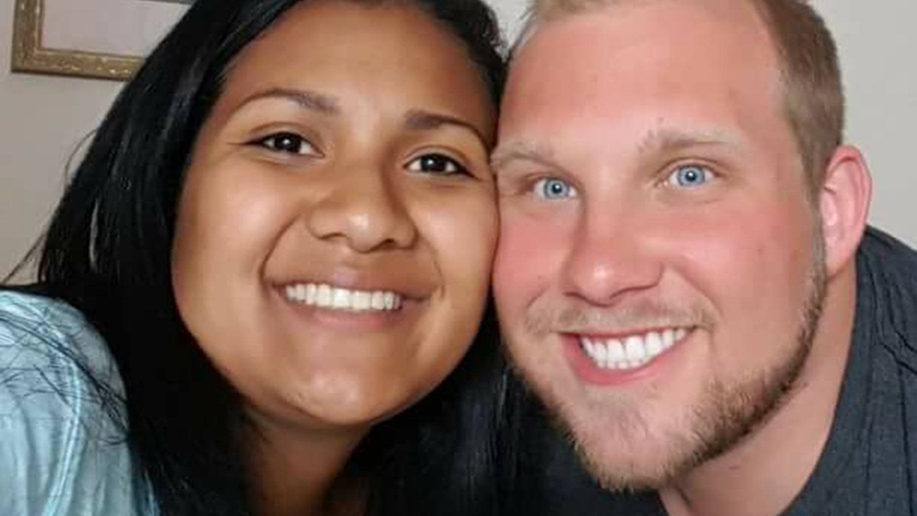 Thamara Caleño, left, and her husband, Joshua Holt.
