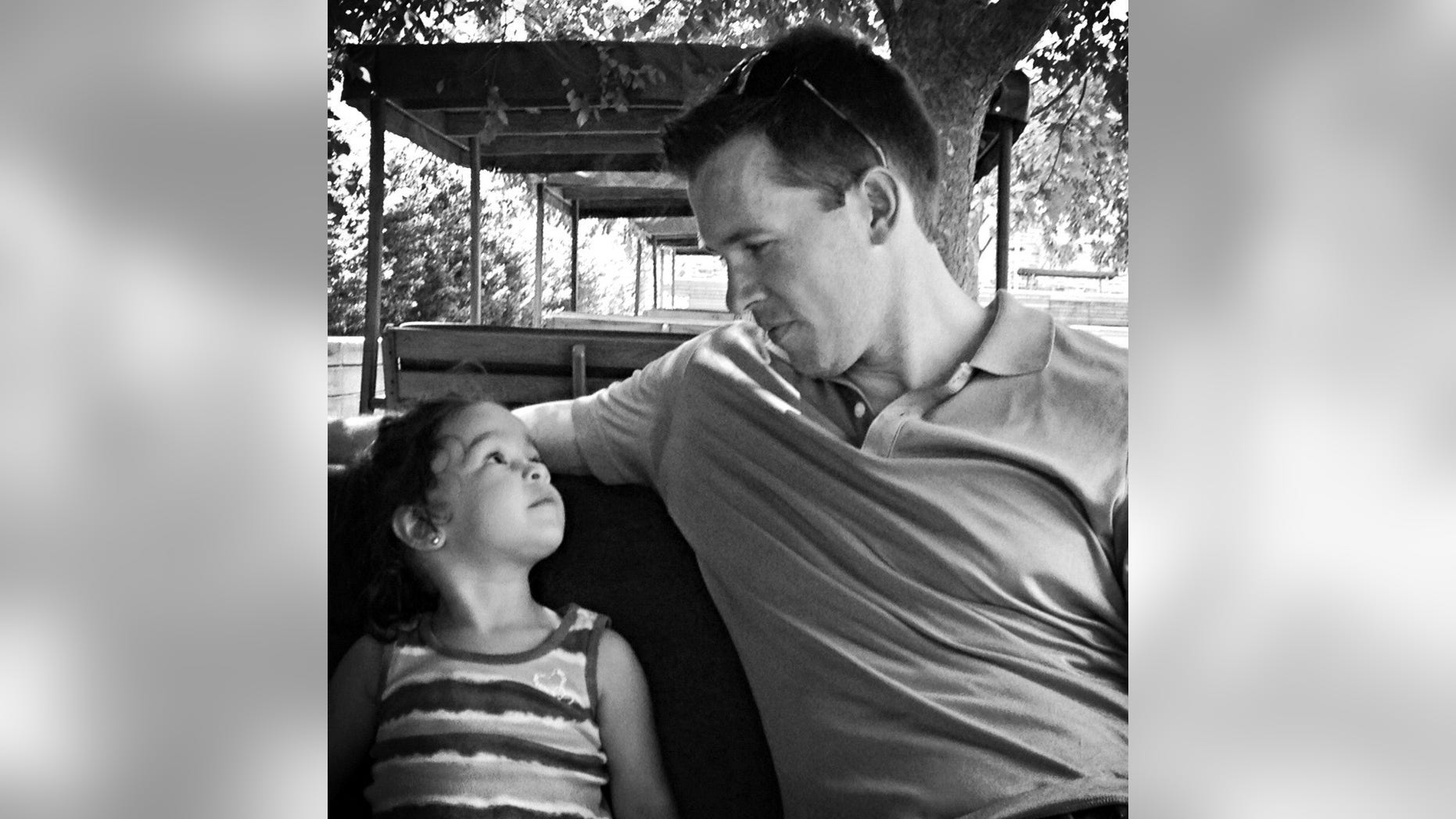 Joshua Rogers and his daughter.