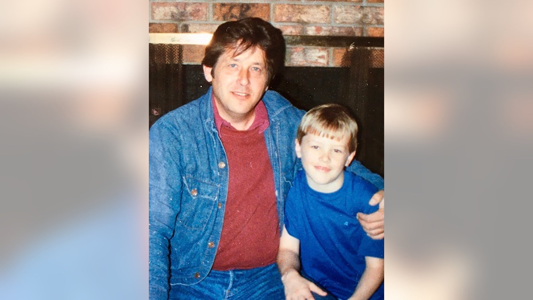 Rogers photographed with his father.
