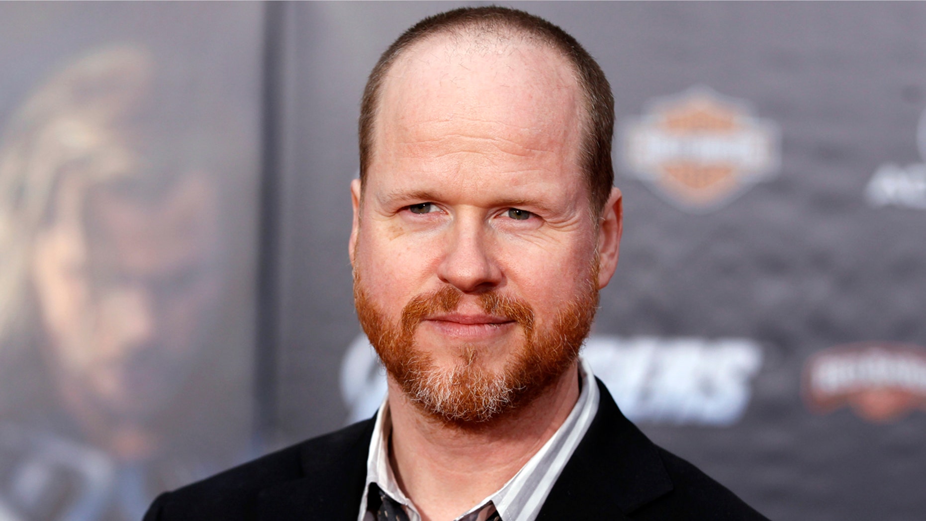 Director Joss Whedon poses at the world premiere of the film "Marvel's The Avengers" in Hollywood, California April 11, 2012. REUTERS/Danny Moloshok (UNITED STATES - Tags: ENTERTAINMENT) - GM1E84C10L601