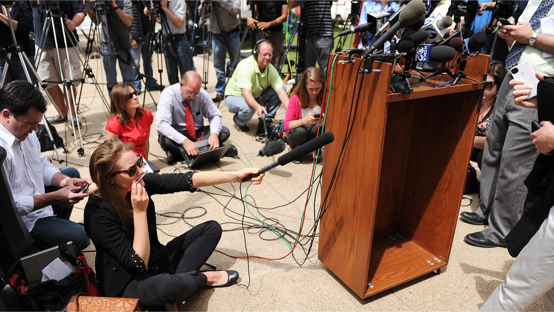 BELLEFONTE, PA - JUNE 6: Journalists take notes as they listen to pool reporters read their notes on the second day of jury selection in the former Penn State assistant football coach Jerry Sandusky child sex abuse trial at the Centre County Courthouse on June 6, 2012, in Bellefonte, Pennsylvania. All jurors have been selected for the trail in which Sandusky is charged with 52 criminal counts of alleged sexual abuse of children. (Photo by Patrick Smith/Getty Images)
