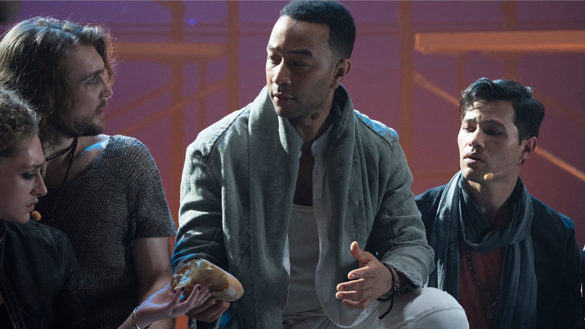 JESUS CHRIST SUPERSTAR LIVE IN CONCERT -- "Promo Shoot" -- Season: 2018 -- Pictured: (l-r) Ensemble, John Legend as Jesus Christ, Jason Tam as Peter -- (Photo by: Virginia Sherwood/NBC)