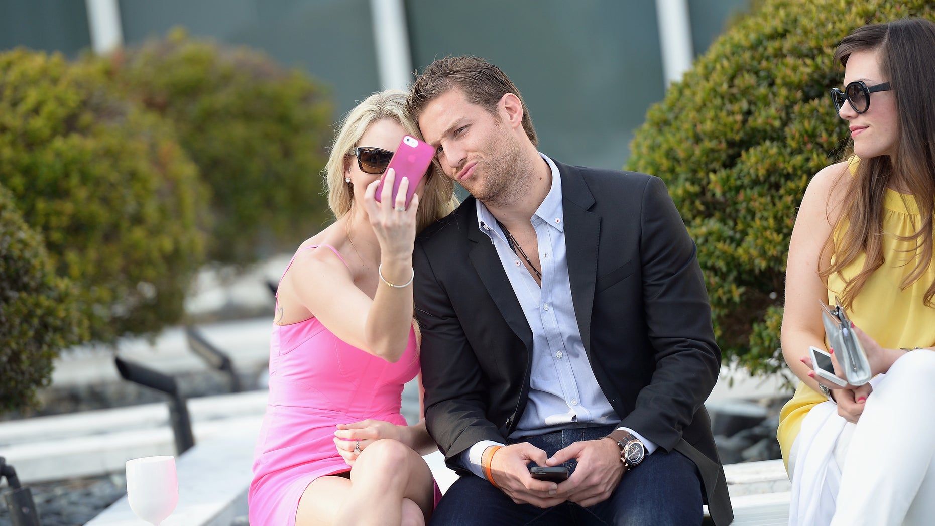 Nikki Ferrell and Juan Pablo Galavis attends the Moet & Chandon "Tiny Tennis" With Roger Federer at Club 50 at Viceroy Miami on March 19, 2014 in Miami, Florida.