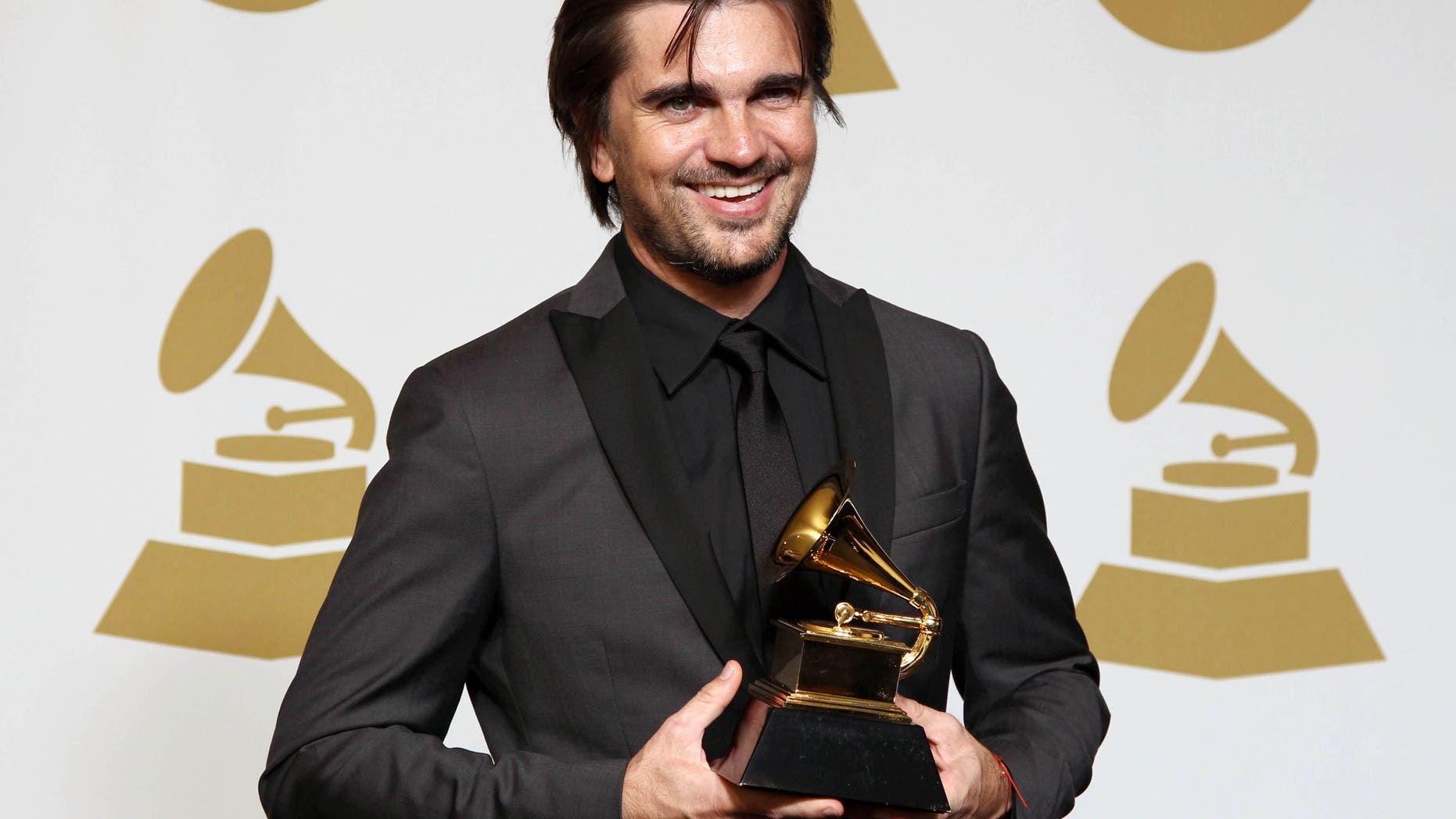 Juanes at the 55th annual Grammy Awards on Sunday, Feb. 10, 2013, in Los Angeles.