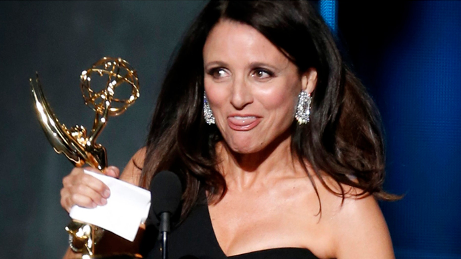 Julia Louis-Dreyfus accepts the award for Outstanding Lead Actress In A Comedy Series for her role in HBO's "Veep" at the 67th Primetime Emmy Awards in Los Angeles, California September 20, 2015. REUTERS/Lucy Nicholson - RTS22NB