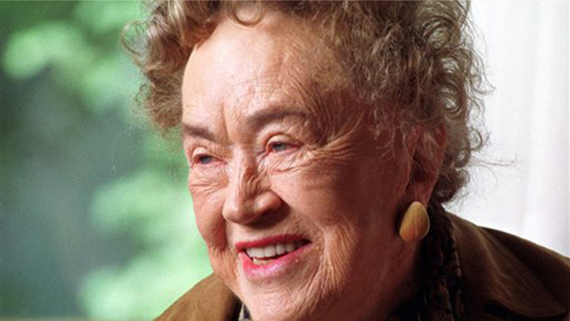 FILE - Julia Child changed the way Americans look at food as well as the way women looked at cooking and themselves.
