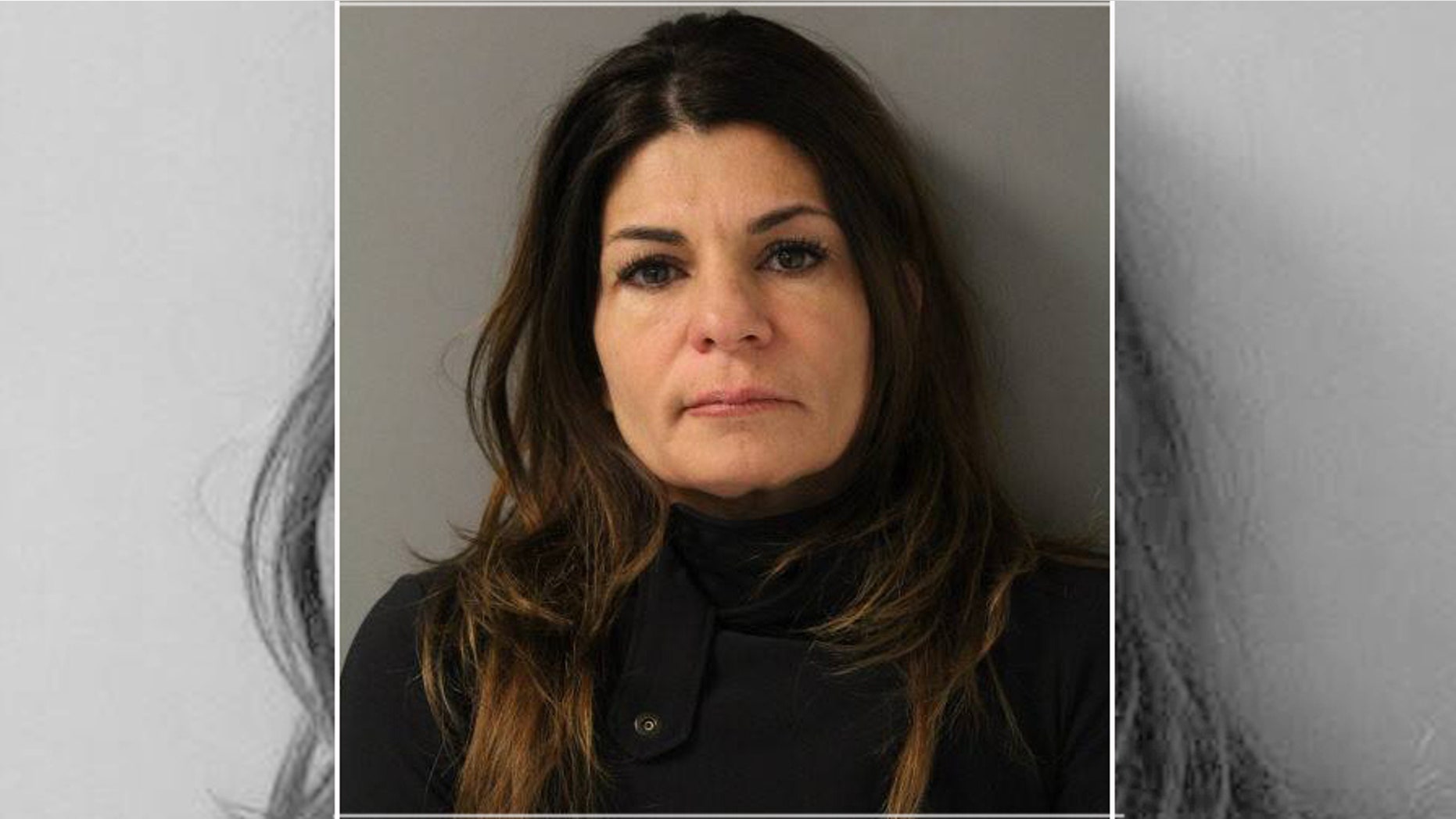Mugshot for Julie Gagne, 47, of Barrington, Illinois, accused of torching her Infiniti SUV with a flamethrower she purchased online.
