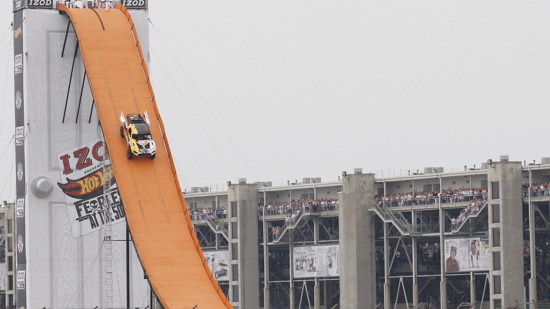 Tanner Foust of Team Hot Wheels sets a new world record with a 332 ft. distance jump at the IZOD Presents Hot Wheels Fearless at the Indy 500 on Sunday, May 29, 2011, in Indianapolis. (Ross Dettman/AP Images for Mattel)