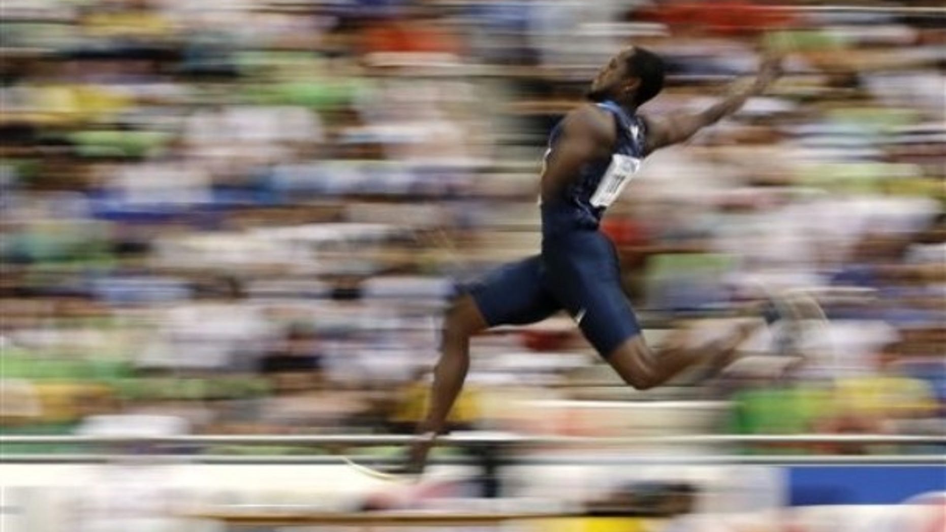 USA's Dwight Phillips competes in a Men's Long Jump qualification round at the World Athletics Championships in Daegu, South Korea, Thursday, Sept. 1, 2011. (AP Photo/David J. Phillip)