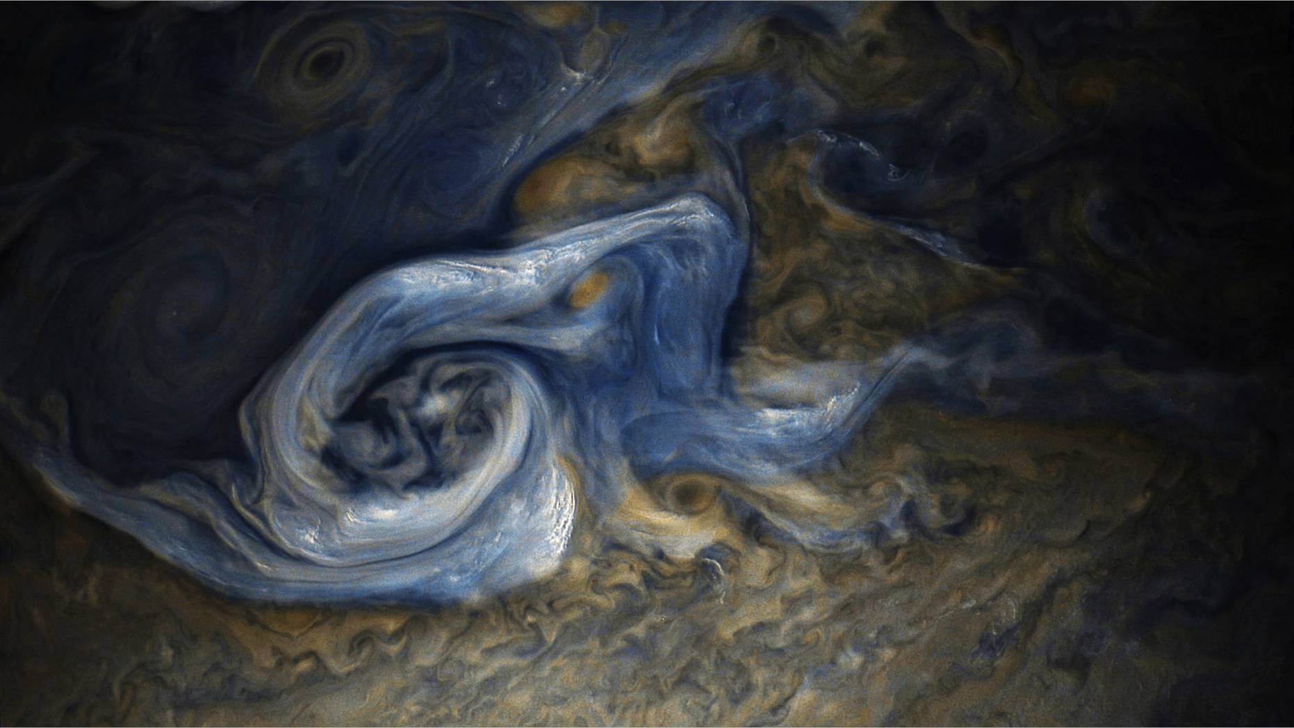 An enormous storm on Jupiter appears in a striking new image from the Juno spacecraft, taken when Juno was 6,281 miles (10,108 km) from the planet's cloud tops. The image scale is 4.2 miles/pixel (6.7 km/pixel).