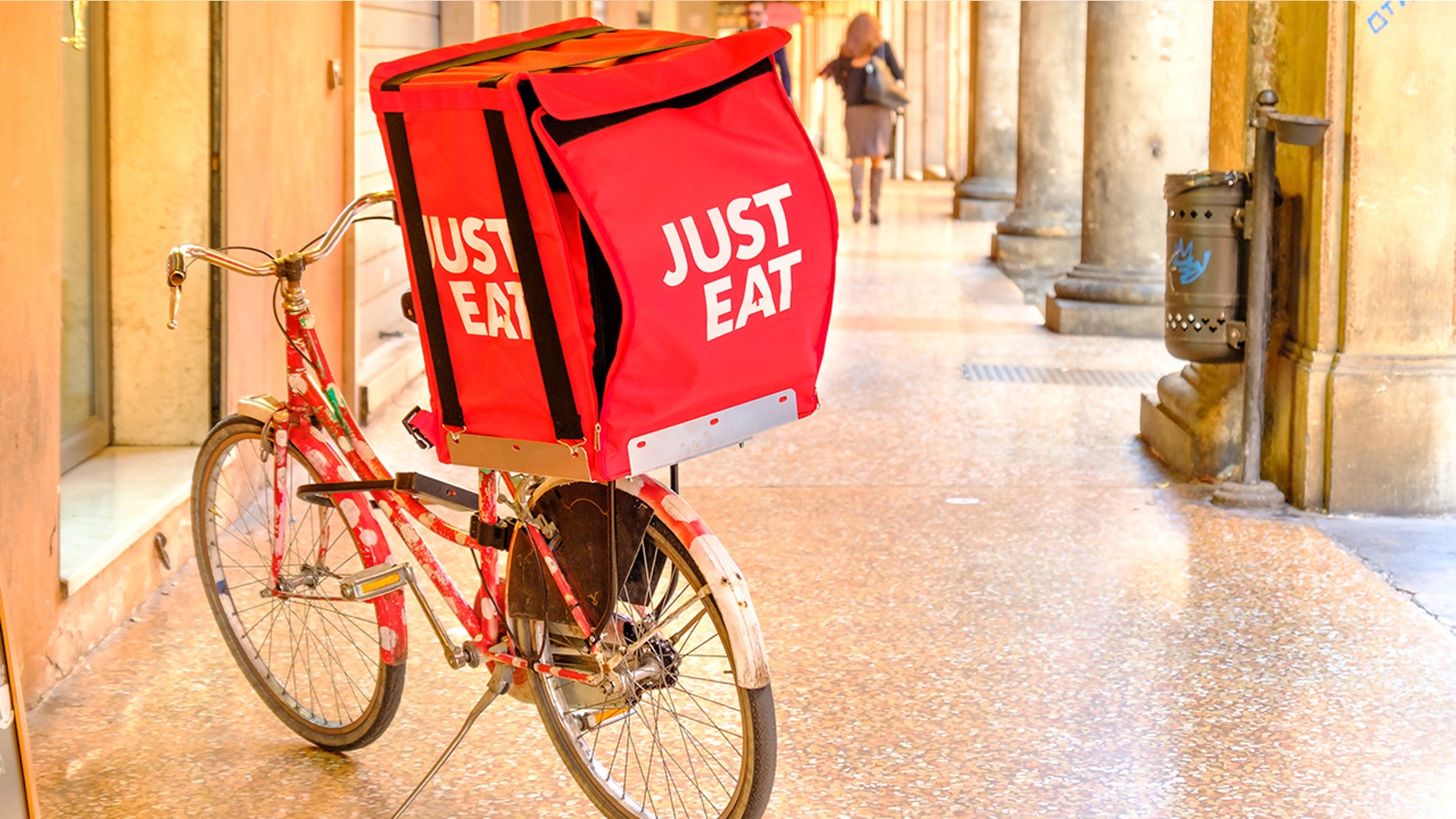 A woman says a Just Eat delivery man harassed her over text and company did not respond how she expected.