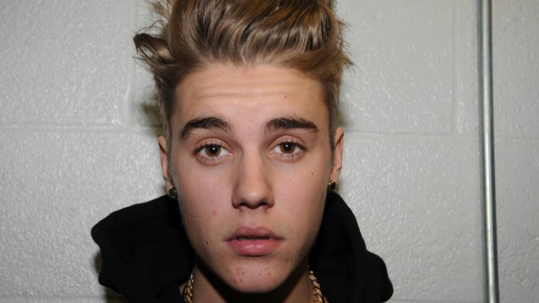 January 23, 2014. Canadian pop singer Justin Bieber is pictured in police custody in Miami Beach, Florida.